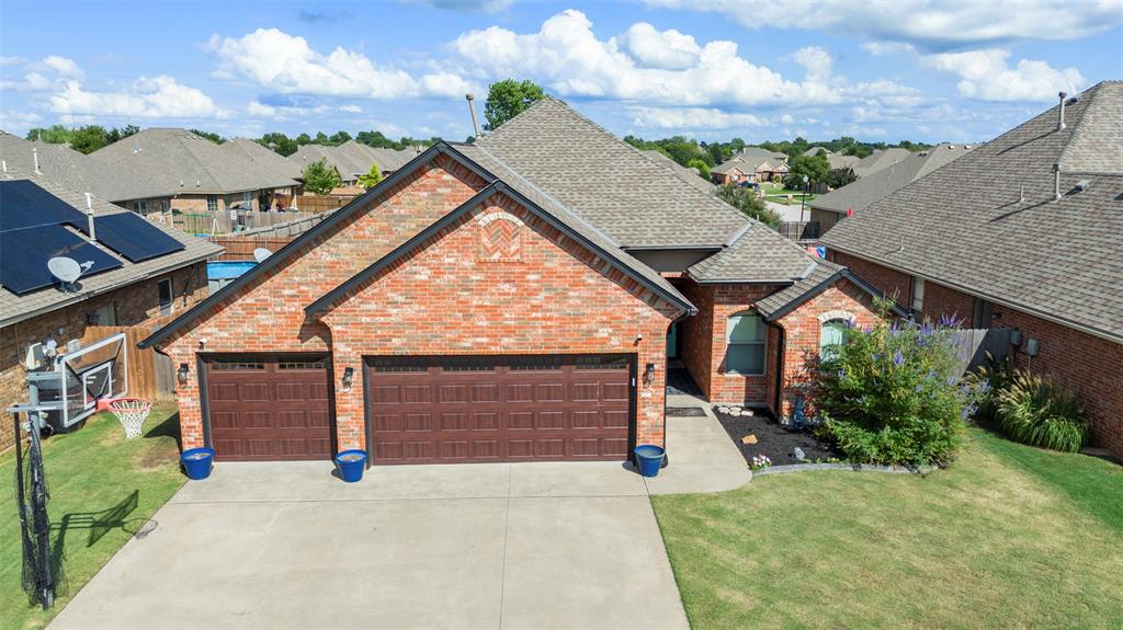 Welcome to your own backyard resort in the heart of Moore School District. This inviting 3-bedroom, 2-bath home is designed for everyday comfort and memorable moments. The open living area is perfect for movie nights, gatherings, or simply unwinding at the end of the day. The kitchen is the true heart of the home, offering granite countertops, stainless steel appliances, and plenty of space for meal prep or relaxed conversation. The dining area flows effortlessly for everything from quiet mornings to weekend entertaining.

The primary suite is your private retreat, featuring a spacious layout, spa-inspired bath with soaking tub and walk-in shower, double vanity, and a generous closet. Two additional bedrooms provide flexible options for guests, a home office, creative pursuits, or whatever fits your lifestyle.

Step outside and discover the ultimate backyard oasis. Enjoy a sparkling saltwater heated pool and a bubbling hot tub for that vacation vibe year-round. The covered pergola is ideal for outdoor dining, summer get-togethers, or peaceful evenings under the stars.

With quick access to top-rated schools, shopping, and dining, this home delivers the perfect blend of comfort, style, and resort-inspired living.