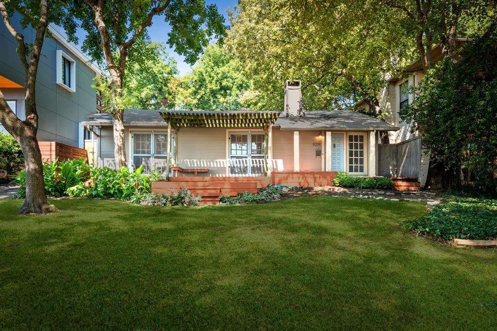 Your dream location is here for you! This fabulous home is nestled amongst the gorgeous mature trees on White Rock Lake in the desired Peninsula Neighborhood. This area in Dallas is known for being the epitome of luxury locations near downtown Dallas where nature and the city life is at your fingertips. This 3 bedroom, 2 bath multi level home is your blank canvas to making this your dream home or creating another space. The homes beautiful features include a double sided fireplace, with double doors opening to the front patio and gorgeous views of the park across the street.  The elevated topography allows for gorgeous views of the lake and downtown Dallas. The stunning views and location is why this neighborhood is sought after for the desirable features surrounding you, the close proximity of the lake, parks, and nature. With all the beautiful aspects of this area, you can see why its unparalleled for the ultimate living experience in Dallas.  If you desire to have an active lifestyle and abundance of trails, Family friendly atmosphere, recreational opportunities throughout, boating, fishing, walking distance to schools and numerous parks surrounding then, you don't want to miss this rare opportunity to create your own paradise.
