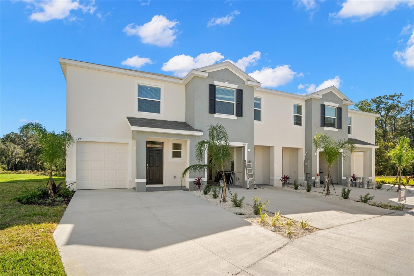 Short Sale. The most private townhome in Union Park: a 1,758 sq ft concrete block end unit on an 8,258 sq ft lot, the largest in the community, in a building set further from its neighbors than any other in the subdivision, with no rear neighbors and pond, woods, and mature trees in every direction. Open ground floor with a large kitchen and refrigerator, dishwasher, electric range, and microwave included, family room opening to a screened rear lanai over the water (SCREENED LANAI was added after photos), and upstairs a primary bedroom with en suite bath, two additional bedrooms, full bath, laundry room with washer and dryer, and a loft overlooking the pond. HOA covers Spectrum high-speed internet and cable, lawn care, and exterior maintenance, with a resort-style pool, lap pool, clubhouse, fitness center, basketball court, splash pad, dog park, playground, nature trails, Zen Garden, and Birdhouse Village, and the A-rated Union Park Charter Academy steps away. Minutes to The Shops at Wiregrass, Tampa Premium Outlets, AdventHealth Wesley Chapel, SR-56, and I-75, under 40 minutes to downtown Tampa and the airport. Priced under the only competing end unit in the community.