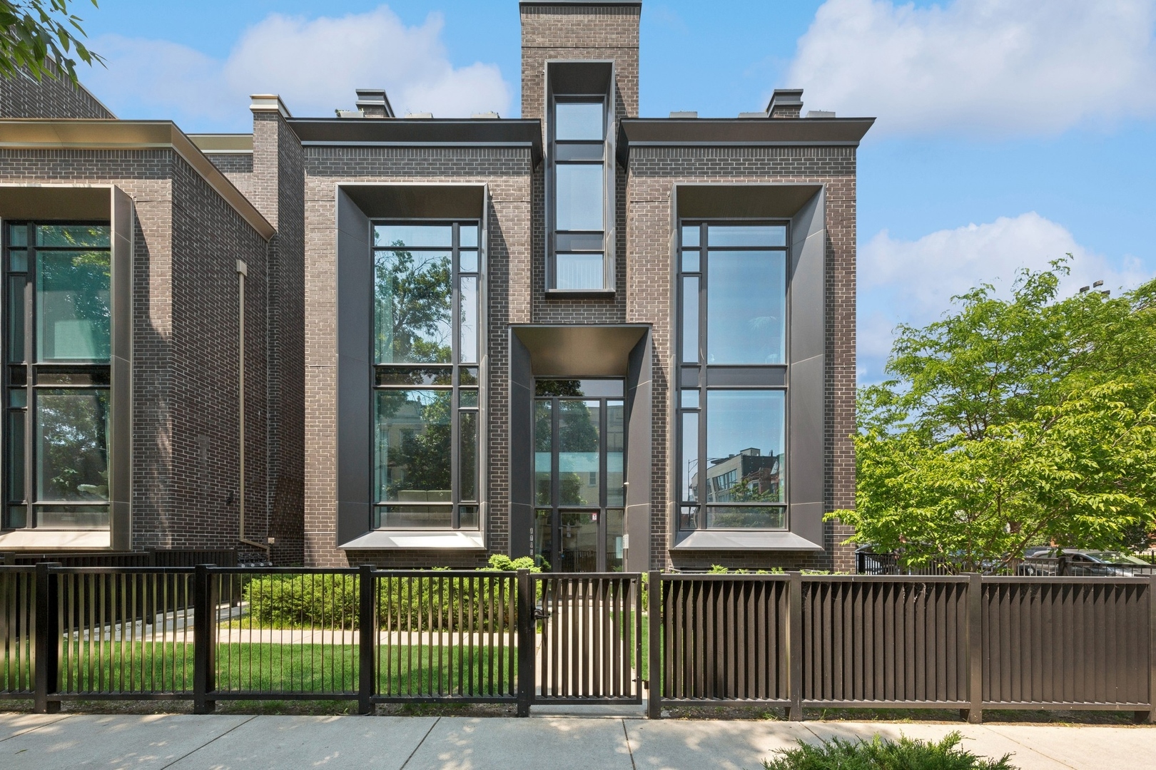 Welcome to 2756 N Magnolia Avenue Penthouse-Lincoln Park's most exclusive residence, where every inch exudes magazine-worthy glamour and sophistication. Occupying the entire top floor of a modern boutique building constructed by Noah and spanning over 2,600-square-ft is a rare jewel with no comparable inventory in the neighborhood. From the moment you step into the sunlit foyer, you're enveloped in a world of high design and luxury. Soaring 12-foot ceilings, floor-to-ceiling windows, and custom finishes set the tone for an unparalleled living experience. The centerpiece is the chef's kitchen, featuring custom cabinetry, quartz countertops, high-end Thermador appliances, and a striking glass-enclosed, temperature controlled wine room. The open-concept living and dining area boasts chic built-in shelving, tray lighting, and a state-of-the-art retractable TV, creating a perfect space for both relaxation and entertaining. Beautiful french doors open to one of five private outdoor spaces, including a private deck with a built-in fireplace-ideal for sunset views and gatherings. The luxurious primary suite offers a custom walk-in closet with gorgeous lighting, spa-like bath with steam shower, soaking tub, double vanity, and an invisible TV in the mirror. Equipped with Control4, the home features a built-in sound system throughout the indoor and outdoor spaces. Additional amenities include two heated garage parking spaces and a storage room. Located in the sought-after Lincoln Park neighborhood, this penthouse offers unparalleled luxury and convenience. Don't miss the opportunity to own this one-of-a-kind residence.