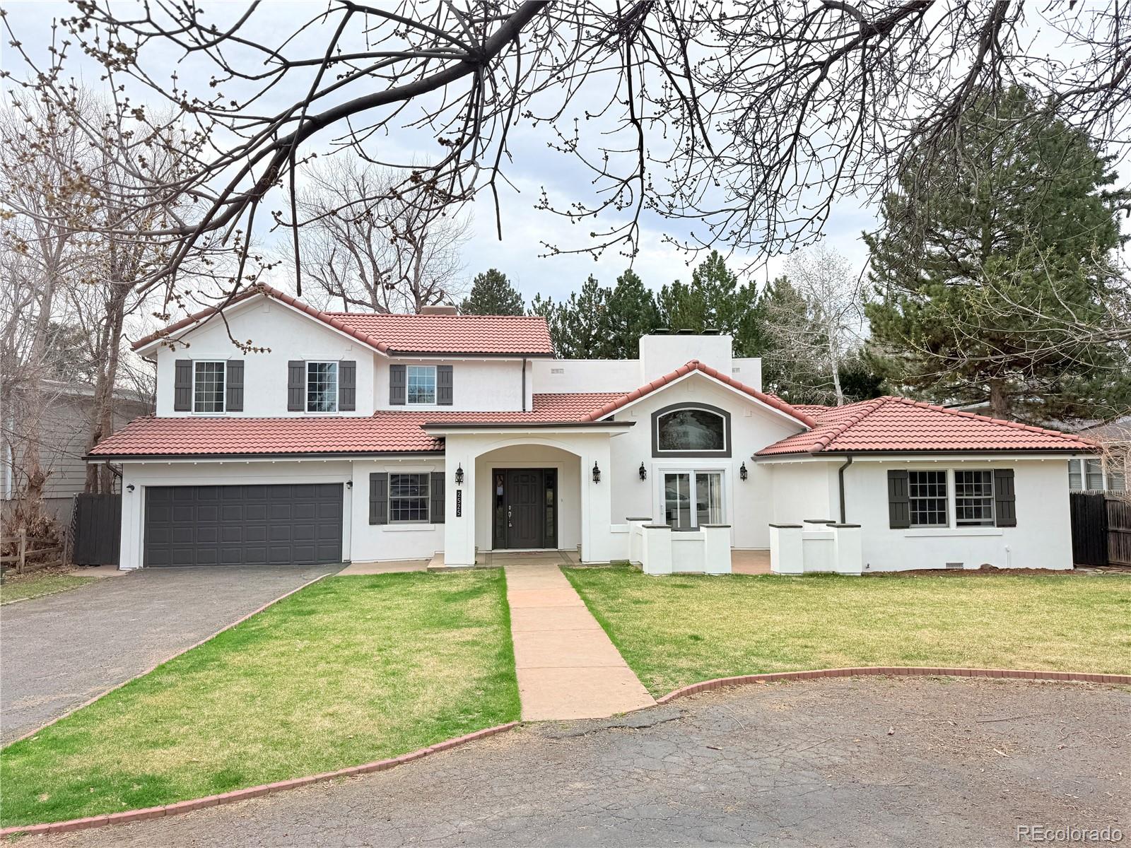 PROFESSIONAL PHOTOS WILL BE AVAILABLE ON 3/27. Set on a rare 15,300 sq ft lot in the heart of University Park, this home offers a flexible, comfortable layout in one of Denver’s most sought-after neighborhoods and top-rated school zones.The main level features vaulted ceilings in the living room, a separate family room with built-ins, and a covered patio just off the kitchen and dining area for seamless indoor-outdoor living. This level also includes a private office, laundry/mud room, and a separate bedroom wing with two bedrooms and a full bath - well suited for guests, multigenerational living, or a quiet work-from-home setup. A large utility room off the attached two-car garage adds excellent storage and valuable flex space for a gym, hobby area, or game room.Upstairs, the primary suite includes a 5-piece en-suite bath, dual walk-in closets, and a versatile nook that can serve as a dressing area, nursery, or workspace. Two additional bedrooms, a full bath, and an oversized bonus room provide even more options as your needs evolve.The lot is a true highlight, offering a range of possibilities: expand the existing footprint, design a backyard retreat, add an ADU, or explore the potential to split the lot and build one or more custom homes, as others have done nearby. Or simply enjoy the setting as-is - gathering around the fire pit and taking in the privacy and peaceful setting that are increasingly rare in central Denver.With five bedrooms, multiple living areas, fresh interior and exterior paint, and updated lighting, the home offers immediate livability with room to grow. The location on a quiet, tree-lined street is hard to beat, with easy access to parks, trails, I-25, Light Rail, the YMCA, DU, and a variety of nearby shops and restaurants.