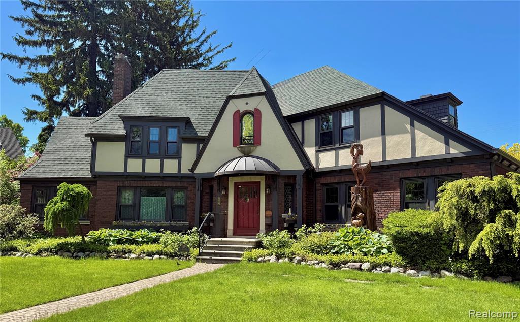 This home is known and loved by many as the quintessential Royal Oak home. This is the home many people dream of owning when they pass by. In addition to its curb appeal, this home has been updated while retaining its essential charm and character. I believe this was the first home in the Royal Oak area to have a four-car attached garage, and it may be even more helpful now than when it was built; the driveway has a full paver set, leading to that spectacular garage. The home has beautiful large rooms, each with its own special, curated character. The first floor has two areas that could be used as home offices or for any modern need. The formal dining room is huge, and the updated kitchen is large and spacious with all the storage you could dream of. Loads of storage and extra-wide hallways on the second floor. So many special details are included: A balcony off of one of the bedrooms; a first-floor half bath with basket-weave ceramic tile floors; stained-glass windows; an atrium with ceramic tile, recessed lighting, along with direct access to the living room and backyard patio; a massive dining room with two walls of windows overlooking a second patio and walkway; living room with a gas fireplace with tile surround and built-in display case; separate workstation in the kitchen with beautiful glass-front cupboards; a great pantry for storage; ceramic backsplash; leaded glass doors; I could go on and on about the period accents in this home! It is just GORGEOUS!  Within walking distance of downtown Royal Oak and on one of the city's top three streets. Please note: pre-approved buyers only with signed buyer's agency documents will be considered.