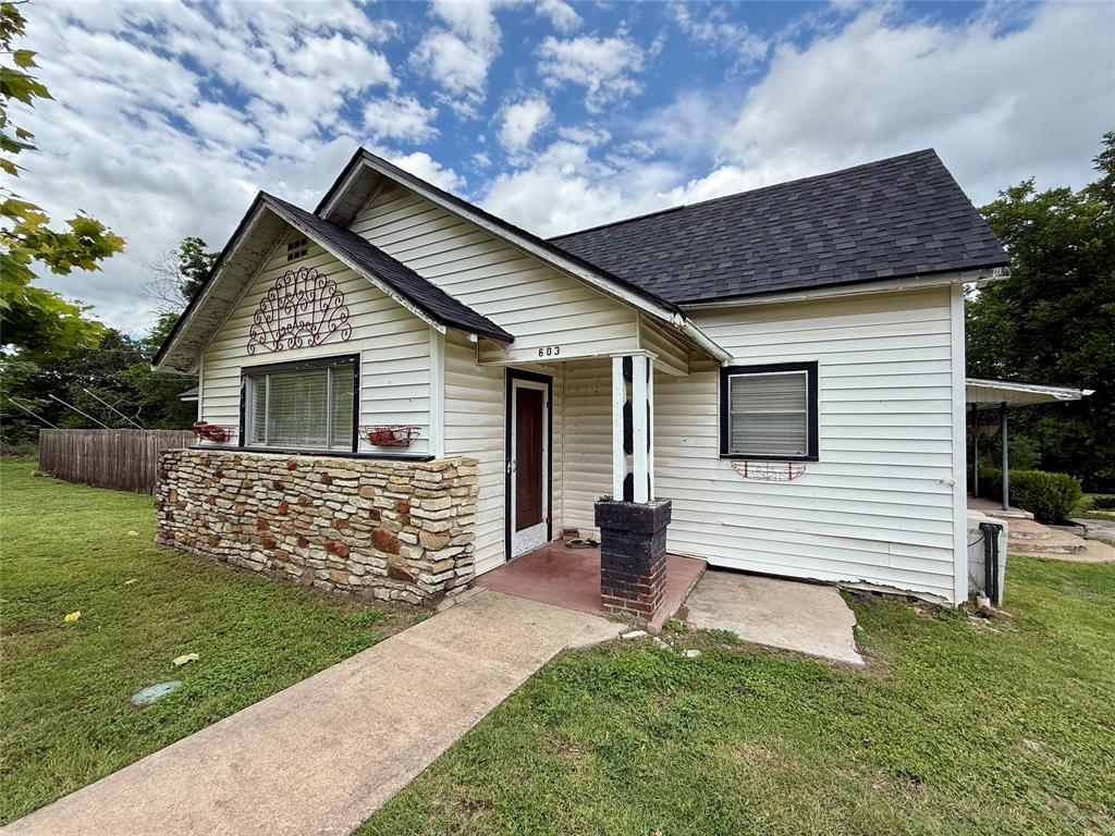 Welcome to 603 N Mesquite St. an ideal setup for multi-generational living or investment potential, right in the heart of Hico. This charming property features a main home plus a separate in-law suite, offering flexible space for extended family, guests, or rental income. The detached suite provides privacy and independence while remaining just steps away from the main house.

You’ll also find a separate storage building with its own bathroom and laundry hookups—perfect for a workshop, studio, or future conversion. The spacious, privacy-fenced backyard is great for pets and play, with a generous deck for relaxing or entertaining under the Texas sky.

Inside, enjoy abundant storage and a functional mud laundry room with room for updates. Whether you’re looking for a comfortable residence with room to grow, rental potential, or a place to accommodate family, this property is full of opportunity.