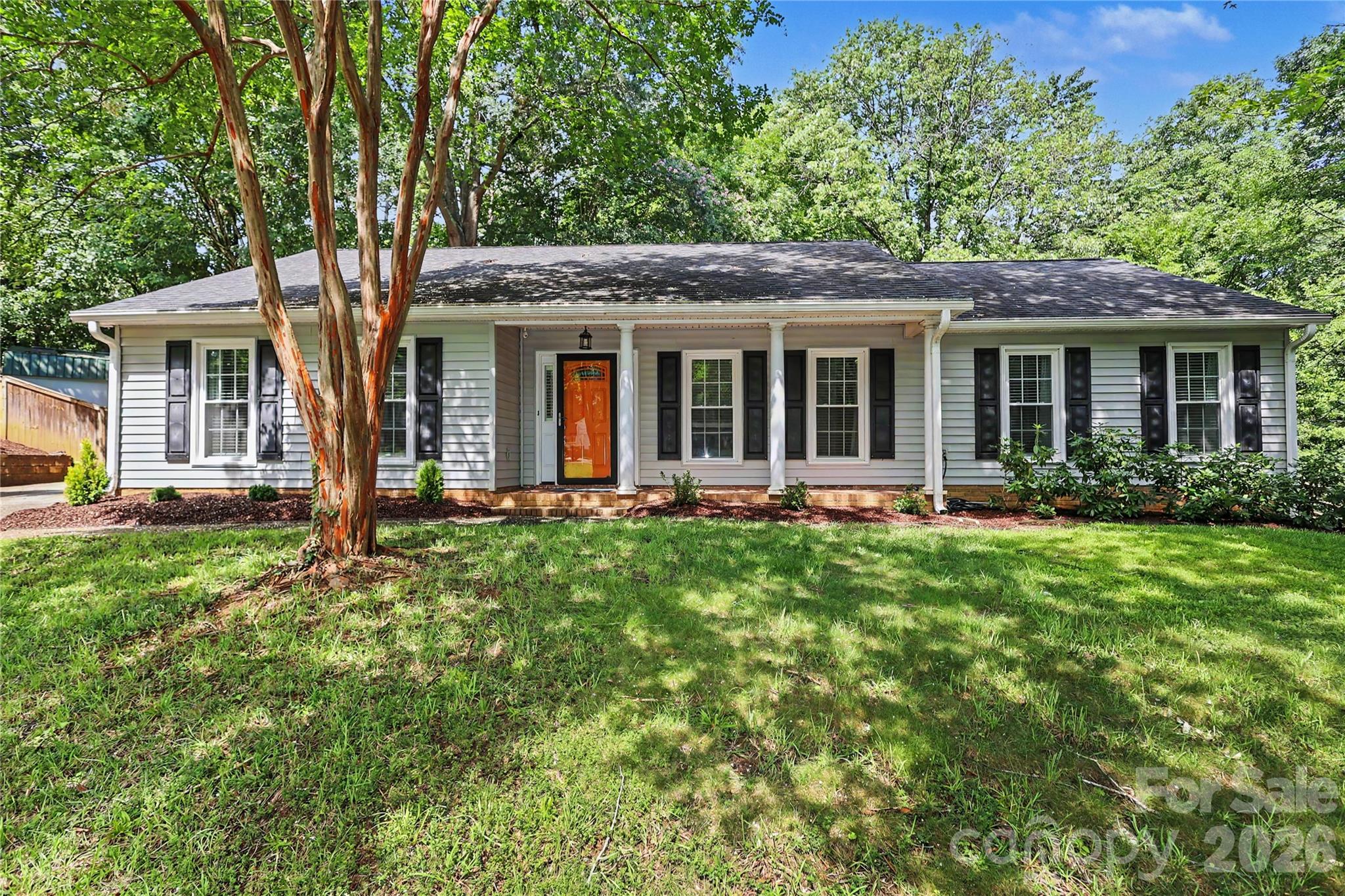 Charming, tastefully updated hilltop ranch on quiet cul-du-sac street in desirable Huntingtowne Farms.  Kitchen features new (within the past year) stylish Charcoal Gray cabinetry with quartz counters, marble tile backsplash and stainless appliances; opens to spacious, airy Living Room. Around the corner is a cozy den, perfect for settling in with a book by the wood-burning fireplace. Both baths are also updated with elegant tile flooring, quartz counters and under-mount sinks.  Bedrooms are amply-sized with good closets for the era! Luxury vinyl plank flooring throughout the home (exception: ceramic tile in baths & laundry). Adjacent to the kichen is the well-appointed laundry room/drop zone with pantry storage. Step out back to the spacious grilling/patio seating area overlooking the lovely, private fenced backyard.  A great space for outdoor gatherings! From Huntingtowne Farms, enjoy easy access to the Greenway, parks, the neighborhood elementary school + join (optionally) the South Park Swim and Racquet Club (on Huntingtowne Farms Lane). Minutes from South Park and Quail Corners. Beautiful and move-in ready... Welcome Home!