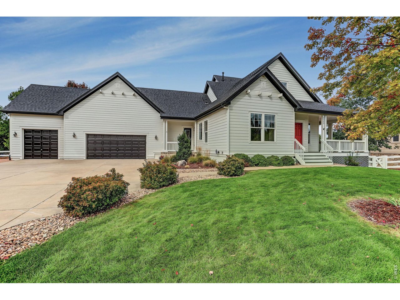 Meticulously maintained and beautifully updated, this Rinn Valley home offers exceptional living on a .62 acre lot with mature trees, tasteful landscaping and a fenced backyard with a storage shed. An inviting wrap-around porch welcomes you inside to a light and bright open floor plan featuring new Karastan premium carpet throughout and newer interior and exterior paint. The oversized eat-in kitchen is designed for both everyday living and entertaining, with freshly painted cabinets, new backsplash, granite countertops and newer Bosch dishwasher and refrigerator. A raised deck off the kitchen provides the perfect spot to enjoy the outdoors, while the lower level patio expands your entertaining space. The formal dining room offers additional space for gatherings. The main-floor primary bedroom features a beautifully remodeled primary bathroom. The family room showcases a fireplace with new honed marble tile, creating a warm and inviting focal point. A spacious mudroom includes a walk-in closet, laundry sink, new countertops, along with a newer Samsung washer and dryer. Upstairs are two additional bedrooms plus a versatile flex room ideal for a office, work-out room or potential fourth bedroom with the addition of a closet. The full garden-level basement offers 10-ft. ceilings and abundant potential for future expansion. Additional highlights include an oversized 3-car garage with cabinets, new whole-house cellular blinds, radon mitigation system and a 2023 roof with upgraded impact-resistant Class IV shingles. This exceptional property combines thoughtful updates, flexible living spaces, and room to grow.