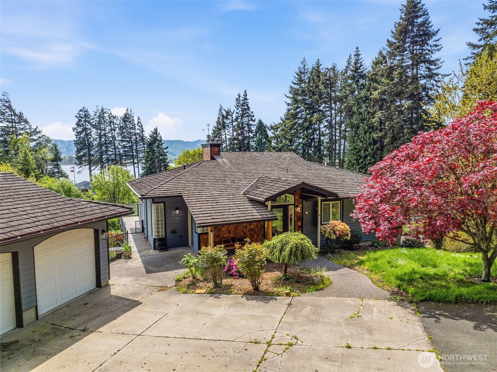 Welcome to Little Cape Horn — one of Wahkiakum County's most coveted waterfront communities along the Columbia River. This 3-bedroom, 3-bathroom home offers 2,845 SF of living space on one acre with Columbia River views and deeded river access that puts fishing, kayaking, and Pacific Northwest waterfront living right at your doorstep. Built in 1996 and thoughtfully designed to take advantage of its natural surroundings, the home features a large garage with an attached shop — ideal for the hobbyist, craftsman, or anyone who needs serious workspace alongside serious scenery. Well and septic in place. Whether you're seeking a full-time residence, a weekend retreat, or an investment with real upside, this property delivers the location and lifestyle at a price that creates opportunity. Cosmetic repairs needed throughout — priced accordingly — giving the next owner the chance to restore this home to its former glory and build immediate equity in the process. Just minutes from Cathlamet and an easy drive from the Portland/Vancouver metro. Rare location. Real value.