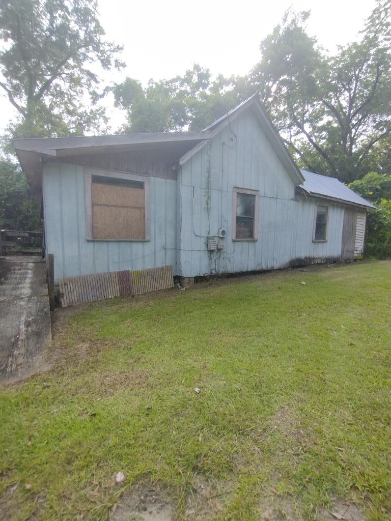 Investor's Opportunity – Prime Lot in Growing Area!  Nestled in the heart of Thomasville, this .38-acre lot sits in a neighborhood undergoing exciting revitalization with new construction homes popping up next door. While the existing structure is uninhabitable and cannot be accessed, the real value lies in the land itself. This is a land-only sale, being sold as-is—perfect for investors, builders, or visionaries ready to bring new life to this desirable location. Don't miss your chance to be part of the neighborhood's transformation!