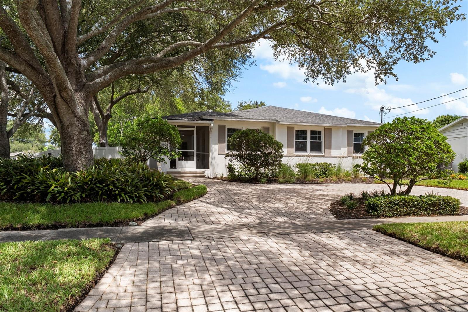 Welcome to this well-maintained 3-bedroom, 2-bathroom pool home in the heart of Virginia Park, ideally situated on a corner lot with fresh landscaping that adds to its inviting curb appeal. A screened-in front porch offers the perfect spot to enjoy your morning coffee, unwind at the end of the day, or take advantage of additional comfortable outdoor living space. Inside, a welcoming sitting area alongside the dining room flows seamlessly into the main living area, creating an easy layout for both everyday living and entertaining. Just off the main living space, the primary bedroom features an updated en suite bathroom, while two additional bedrooms share a full hall bath that is also conveniently accessible for guests. A versatile bonus room provides added flexibility for a home office, playroom, fitness space, or additional living area. The home has been thoughtfully maintained and features hurricane-impact windows, a newer roof, HVAC system, and water heater, along with fresh interior and exterior paint—offering added peace of mind for the next owner. Outside, the private backyard is designed for enjoying the Florida lifestyle, complete with a swimming pool and white vinyl privacy fence. With its desirable Virginia Park location, functional floor plan, major system updates, and inviting indoor-outdoor spaces, this home is ready to be enjoyed.