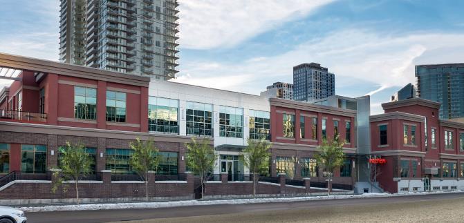 409 10th Ave is a 68,910 square foot, two storey office building located on a 0.90 acre site in
the east side of Calgary’s trendy Beltline District. The building is located in close proximity
to the BMO Centre, downtown +15 network, LRT stations, and proposed River District
revitalization which includes Scotia Place arena.
• 409 10th Ave features an impressive atrium style lobby, high exposed ceilings, a main floor
loading dock, rooftop and second floor outdoor patio, as well as 77 heated underground
parking stalls. Furthermore, 409 10th Ave has been designed to be able to add up to two
additional floors to the East Wing, providing the opportunity for future expansion.
• 409 10th Ave is currently 42% leased to a strong covenant tenant and is a fantastic opportunity
for an owner occupier looking to acquire a well performing, character office property in a high
profile Beltline location, in a strengthening Calgary rental market. This is a unique opportunity
to participate in the future River District revitalization and Scotia Place arena opening which
will bring additional vibrancy to the area.