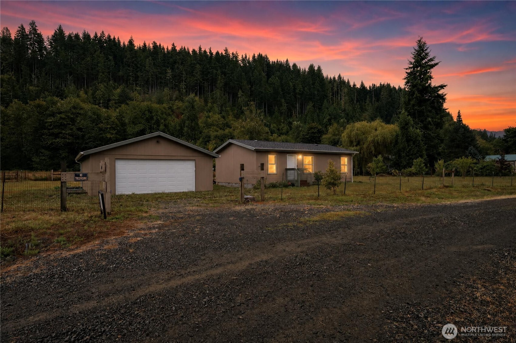 Sellers are VERY MOTIVATED!!  If you're looking for acreage, views, established fruit trees, timber, and room to garden and enjoy the outdoors, this property is worth a look! Discover the peaceful beauty of rural Lewis County at this charming 2022 864 sq ft modular home featuring a 2-bedroom, ¾-bath home situated on just under 8 acres in Glenoma. Partially fenced and offering beautiful territorial views, this property is a wonderful opportunity for those seeking space, privacy, and a connection to nature. The acreage features an impressive variety of established fruit trees, including four types of apples, pears, plums, cherries, figs, and hazelnuts, along with plenty of room for gardening. A seasonal creek adds to the property's natural appeal, while the property borders designated forest land and offers an abundance of marketable timber, including alder, cedar, fir, and maple. A detached 2-car garage provides excellent space for vehicles, equipment, hobbies, or storage. The property also includes a chicken coop and all appliances. The home is equipped with a kerosene mini stove, propane cooking, a tankless water heater, and a propane furnace. Conveniently located between Morton and Randle in the small community of Glenoma, you'll enjoy a peaceful country setting while still being close enough to take advantage of everything Lewis County has to offer. Road maintenance agreement with dues of $100.00 yearly. No CC&R's. Heating is oil-free, standing, and propane Furnace.