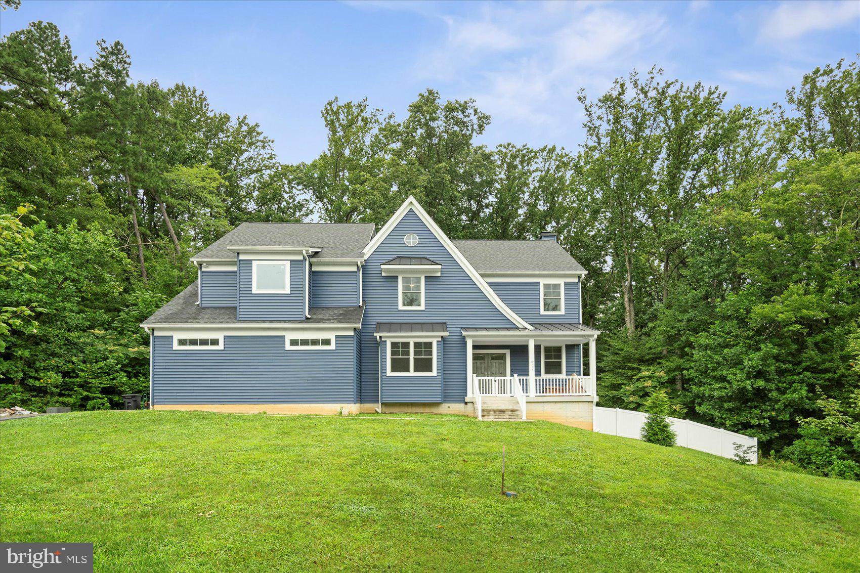 GORGEOUS 4 Bedroom 4 FULL and 1 HALF Bath Colonial in Kingsville * This STUNNING home was built in 2023 and has over 4700 square feet of living space and is on 1.5 acres full of PRIVACY * Features Include: SPACIOUS kitchen with top of the line GRANITE countertops, stainless steel appliances, breakfast bar and a SUN filled window seat overlooking the inground CUSTOM BUILT pool built by Woodfield Pools (heated SALTWATER pool with lights) * LARGE living room with a WOOD burning fireplace, a bedroom, half bath and PET shower completes the MAIN level * LUXURY vinyl plank flooring throughout the house *  The UPPER level offers a HUGE primary suite with sitting room and FULL bath, two additional bedrooms and TWO full baths * On the LOWER level you will find an expansive family room with sliders to the FENCED yard as well as a bar area with refrigerator, FULL bath and PLENTY of storage  * There is a sprinkler system throughout & THREE car garage with a MULTI car driveway * A MUST SEE!!