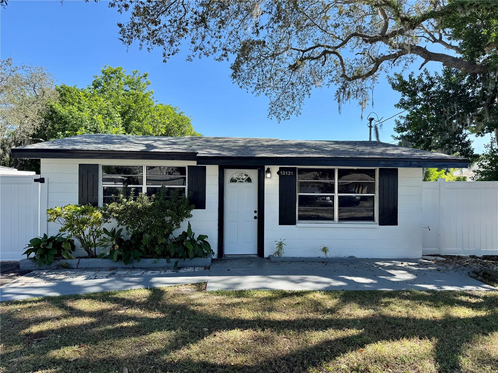 Welcome to this charming 2-bedroom, 2-bath home nestled on a spacious lot in a quiet and family-friendly neighborhood. Enjoy the serenity of peaceful surroundings while being just minutes from some of Florida’s most beautiful beaches. This home offers convenient access to top-rated schools, shopping, dining, recreation, and nearby bus lines—making daily living effortless. With its inviting layout and desirable location, this property is the perfect home for a first-time buyer, growing family or anyone seeking the ideal blend of comfort, convenience, and Florida lifestyle. Roof 2025, HVAC 2016, Hot Water heater 2014.