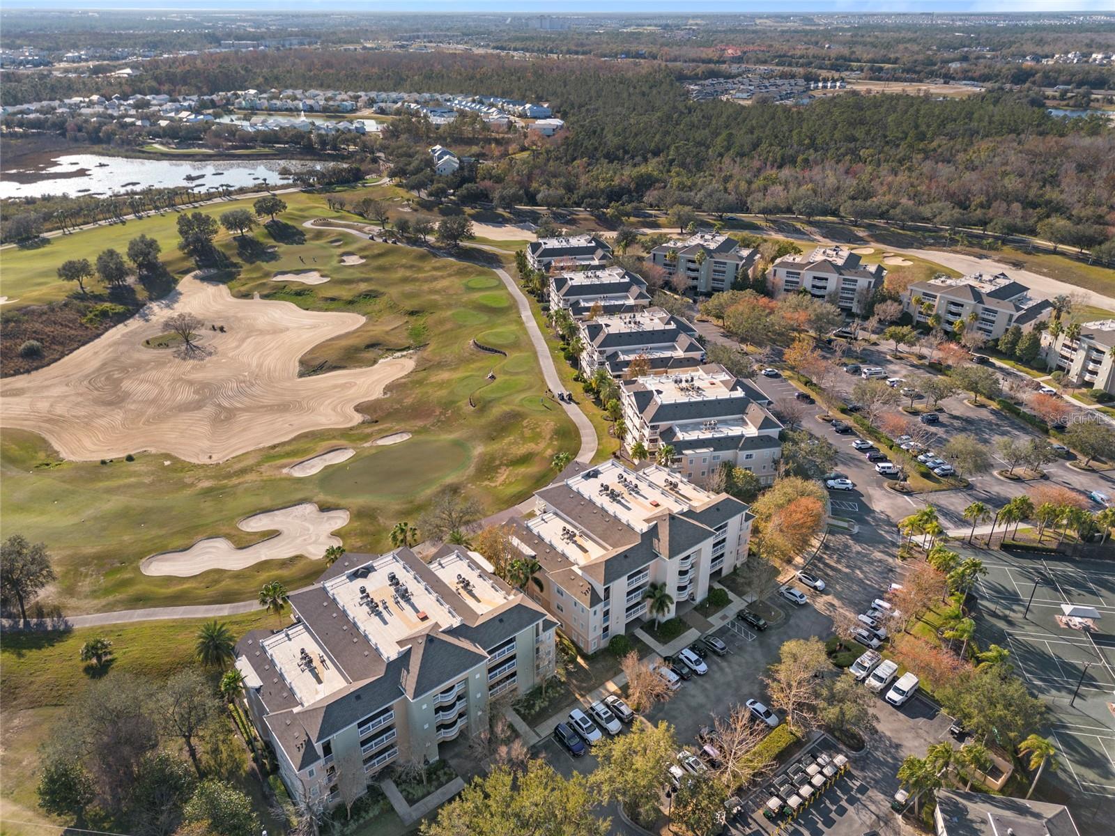 EASY TO SHOW OPEN NOW ***WAIVER OF MEMBERSHIP**SAVE $15000.00** NO MEMBERSHIP ACTIVATION FEE WITH THIS PROPERTY.  What does that mean? It means you don't have to pay the membership initiation fee when you purchase this unit.  HUGE SAVINGS!   EASY TO SHOW!    *End Unit *Natural Light *Windows *Private Owner Storage.  Reunion Resort is the most sought-after community in the Disney Corridor and now is your chance to own a villa in the Centre Court Ridge Neighborhood.  Reunion Resort has everything you want in a community including 3 signature golf courses, world class dining, waterparks, lazy river, water slides, firework viewing areas, tree lined streets, dog park, playground, driving range, golf simulator, member events, in-resort shuttle service, and event space.  Live the resort lifestyle like a VIP.  NO OTHER RESORT IN THE AREA HAS THIS!!!  This villa has a wonderful open floor plan with 3 bedrooms and 3 baths, which you can’t find anymore.  The view is one of the MOST COVETED in the entire resort.  The balcony overlooks multiple holes of golf and is perfect for the first coffee of the day or the glass of wine before turning in.  The community of Centre Court Ridge has its own community pool, pickle ball, tennis, and is home to golf cart rentals.  It is also close to the resorts signature Grande Hotel.  New floor in the living space and furnishings included.  Easy to show and even easier to Enjoy!