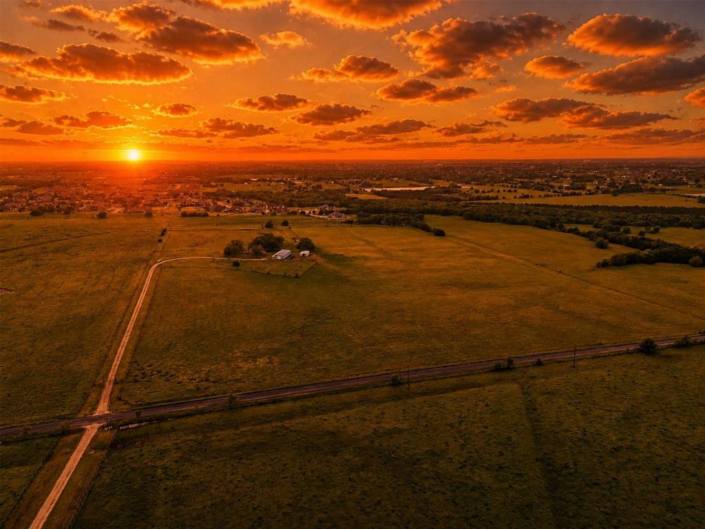 Exceptional 62.09-acre tract located in the highly sought-after Rockwall ISD, offering a premier opportunity for an equine ranch estate or the development of a luxury estate community. Positioned along Dowell Road, the property benefits from a 12-inch water line and electricity available at the site, supporting efficient and cost-effective development.The land features expansive country views and stunning sunset backdrops, creating an ideal setting for high-end residential use while maintaining convenient access to nearby retail, dining, and major thoroughfares.Two additional 2.14-acre tracts are also available, presenting a rare opportunity for expansion, investment, or the creation of a multi-generational estate. Surrounded by established one-acre residential communities, the area demonstrates strong demand for estate-style living. Dowell Road is well known for its 5–10 acre ranchette properties, further reinforcing the long-term desirability and value of this location.