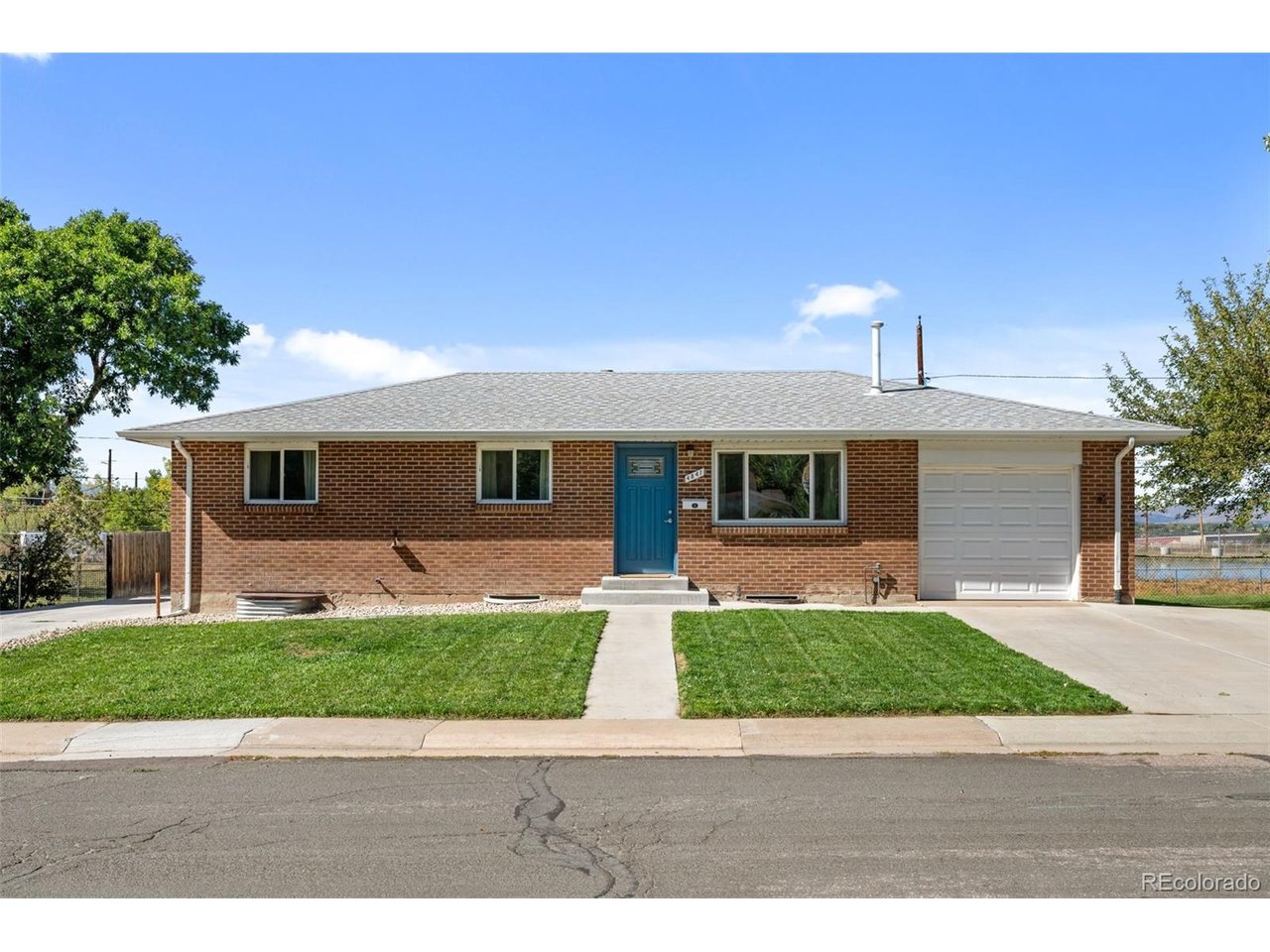 Welcome to this beautifully updated ranch home sitting on a substantial lot in Englewood, where modern comfort meets thoughtful design. From the moment you step inside, the main level greets you with gleaming hardwood floors and an abundance of natural light that pours through the windows, creating an atmosphere that feels both airy and grounded. The spacious living room opens up to an eat-in kitchen, fully equipped with stainless steel appliances and ample cabinetry to keep everything organized.The main floor features a primary suite designed for relaxation, complete with a generous en-suite bathroom. A second well-appointed bedroom is also located on this level, with a full bathroom conveniently situated just across the hall. For those who work from home, the addition provides a dedicated office space, ensuring a quiet environment away from the main living areas.The finished basement significantly expands the home's footprint, offering a large media room or secondary living area perfect for movie nights. You'll also find two additional bedrooms and a bathroom on this level, along with a laundry area and a sizable unfinished space for all your storage needs.Outdoor living is a highlight here. Host guests year-round in the enclosed and finished back patio, or head out to the backyard to enjoy the fresh sod, crisp mountain views and open space. Car enthusiasts or hobbyists will love the parking options, which include a one-car attached garage plus an oversized two-car detached garage with extra room for gear and projects. Located less than .5 mile to Belleview Park, easy access to Big Dry Creek trail, less than 2 miles to Main street in downtown Littleton. Centrally located with easy access to lightrail, highway 85 and Broadway with many restaurants, stores and other amenities nearby!
