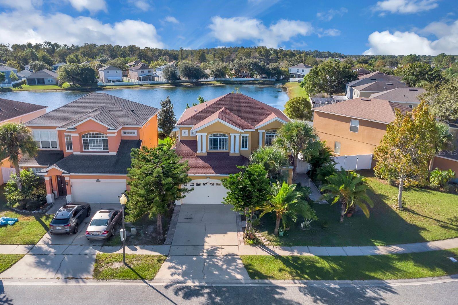 Welcome to This beautiful 4-bedroom, 2.5-bath home is perfectly located in the heart of Orlando—close to airports, top-rated schools, shopping, and dining. Enjoy resort-style living with a large private pool, outdoor kitchen area, and a spacious patio overlooking the lake. Surrounded by lush tropical landscaping, this home offers the perfect blend of comfort, privacy, and natural beauty. Whether relaxing by the pool or entertaining guests outdoors, this property feels like your own private paradise. Move-in ready and available now