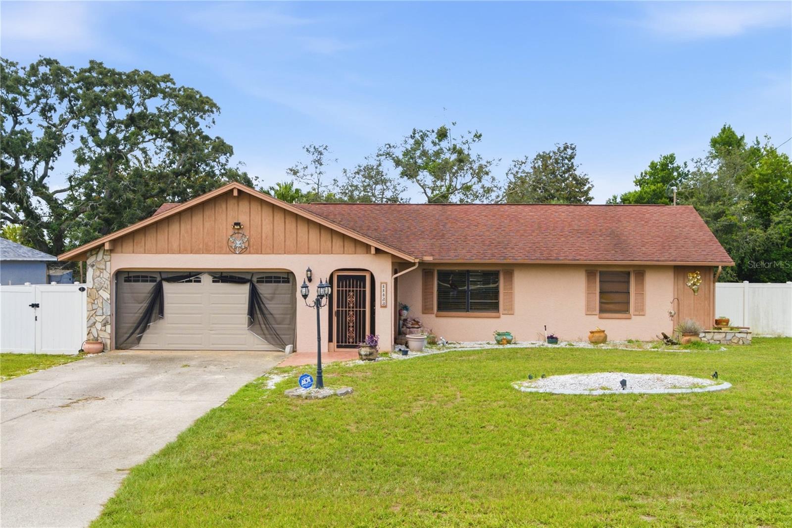 Welcome to this charming 2-bedroom, 2-bathroom ranch-style pool home in Spring Hill! Featuring an open floor plan, cathedral ceilings, and a beautiful wood beam that adds warmth and character to the living space. The spacious layout includes a dedicated dining room and an open-concept living area, perfect for entertaining or everyday living.Enjoy the convenience of being just minutes from US 19 and SR 589, making for an easy commute to Tampa and surrounding areas. You’ll also be close to the beautiful Weeki Wachee River, local restaurants, shopping, and everything Spring Hill has to offer. Spring Hill continues to grow and attract new residents, offering the opportunity to enjoy more home for your money while still being within easy reach of Tampa. Whether you're looking for a primary residence, vacation home, or investment opportunity, this home is worth a look!Please contact the listing agent with any questions or to schedule your private showing.