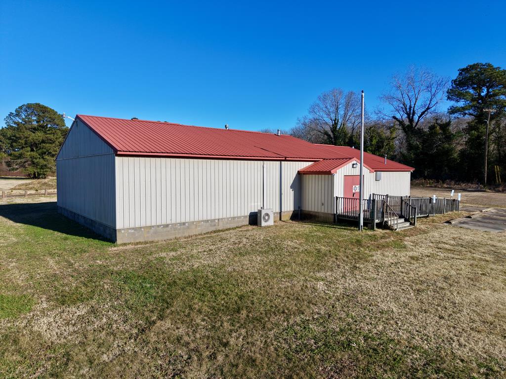 Versatile commercial property located at 21503 Daugherty Rd, Tasley, VA 23441, situated on 2.42 acres and built in 2000. This property offers a flexible layout suitable for a variety of commercial uses. A standout feature is the full commercial kitchen equipped with multiple sinks, ample cabinet storage, and a full lineup of appliances. Please refer to the attached photos for detailed appliance information. The kitchen provides generous workspace ideal for food preparation, catering, or other service based operations. The spacious lot allows for convenient parking, deliveries, and potential future expansion. Conveniently located with easy access to surrounding areas, this property presents a strong opportunity for business owners or investors on Virginia's Eastern Shore.