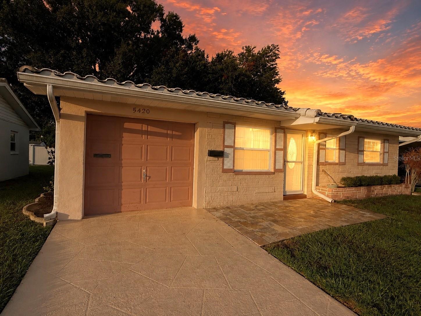 Location, Location, Location! Check out this Beautiful Villa in Springwood II with attached garage and NO Rear Neighbors. Home features updated windows, new water heater, new ceiling fans & LED light fixtures, new luxury vinyl flooring, updated baseboards, newer front entry door & storm door, fresh interior paint, updated electrical panel, outlets & switches, updated bathroom with stall shower, and brick pavered front & back patio so you can enjoy the Florida sunshine. This active 55+ community has some great features including a sparkling community heated pool, updated clubhouse with gorgeous kitchen, patio overlooking a lake, gazebo with lake views, fitness center, library, game room, shuffleboard and more! Fee Includes: Cable TV, Community Pool, Escrow Reserves, Internet, Maintenance Exterior, Maintenance Grounds, Manager, Pool Maintenance, Private Road, Recreational Facilities, Sewer, Trash, Water. Conveniently located just minutes from Mainlands Golf Course, Bill Jackson’s Shop for Adventure, Aldi’s, Freedom Lake Park that offers Dog Park with large, fenced exercise space separated for large and small dogs, hydrants, watering holes, and plenty of shade for your pets, covered outside fitness stations, fishing, grilling, picnic tables, pavilions, brand new playground, walking track and the Korean War Memorial. Easy Access to Gulf Beaches, Sam’s Club, Coffee Shops, Fitness Centers, shopping, dining, Helen Howarth Park, Equestrian Trail, Dog Park and Forbes recreation area, I-275, St. Pete/Clearwater and Tampa International Airports. Come see all the features this beautiful home and community have to offer; it won't last long!