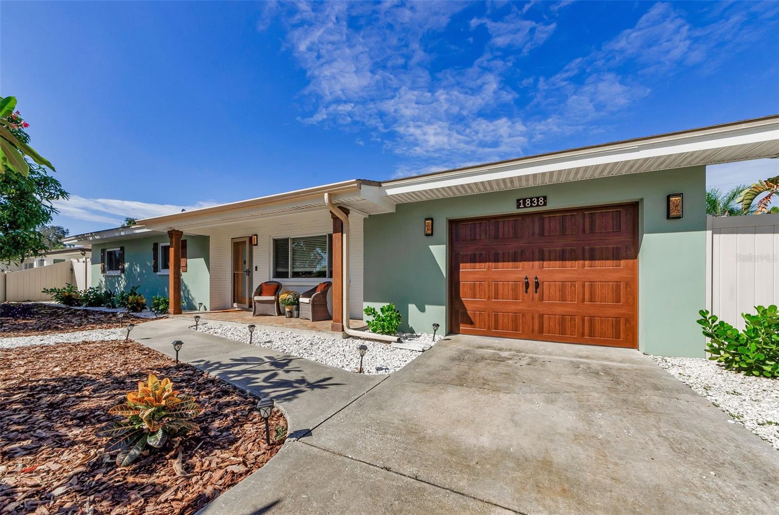 Welcome to this charming 3 Bedroom, 2 Bath, oversized 1 Car Garage home located in Clearwater.  This beautifully well-maintained, single-story home offers a spacious layout, ideal for comfortable living and entertaining!  Inside, you'll find a warm and inviting living room, dining room, and a stunning kitchen complete with rich wood cabinetry and granite countertops.  This home has been lovingly cared for and offers a wonderful flow that makes it both comfortable and functional.  A screened in lanai provides the perfect spot to relax or entertain, while the fenced-in yard offers privacy and plenty of space for outdoor enjoyment.  With its charming curb appeal and thoughtful details throughout, this home is move-in ready and waiting for its next owner!
