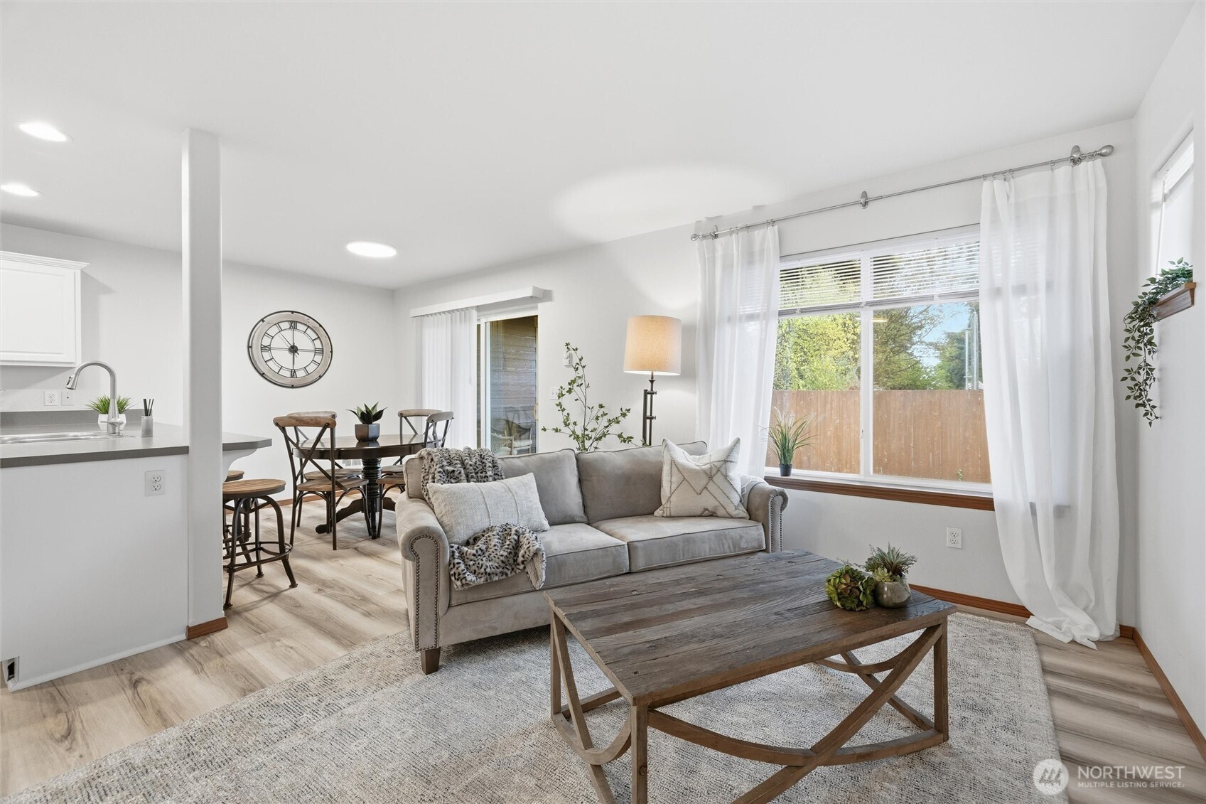 Enjoy the beauty of natural light in your living room, kitchen, and dining room.