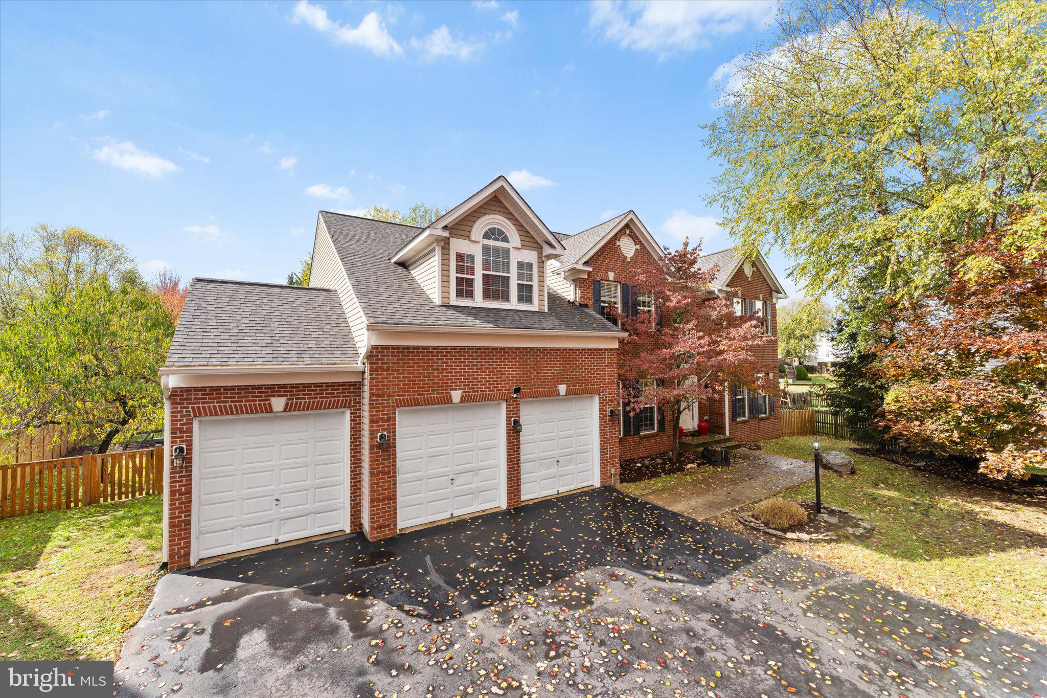Welcome to this exceptional Colorado model home perfectly situated on a premium cul-de-sac lot in the heart of Purcellville! Featuring a rare 3-car garage, a superb flat backyard, and a spacious driveway, this property offers the ideal blend of luxury, comfort, and practicality. Lovingly maintained by the original owners, the home has been pet-free and smoke-free, ensuring pristine condition throughout.Step into a grand two-story foyer that opens to an expansive, light-filled layout with bump-outs in the family room, kitchen, and office. The two-story family room showcases a stunning floor-to-ceiling stone fireplace — the perfect centerpiece for gatherings large or small. The gourmet kitchen impresses with abundant cherry cabinetry, new quartz countertops with a large undermount sink, brand-new GE refrigerator, GE convection wall oven with Wi-Fi connectivity, and a 34" five-burner cooktop on a spacious island. A second stairway conveniently connects to the upper level, and multiple dining options include a formal dining room and casual seating at the island or breakfast area.Upstairs, the airy owner’s suite features a vaulted ceiling, sitting area, and a luxury ensuite bath with two walk-in closets, dual vanities, soaking tub, and separate shower. Each secondary bedroom offers its own walk-in closet, with three full bathrooms upstairs providing exceptional convenience.Recent upgrades include wide-plank luxury flooring (7.5mm rigid core, 22mil wear layer, QuietWalk underlayment) on the main and upper levels, fresh neutral paint, roof (2020)with 40-year shingles, 6” gutters and oversized downspouts, upper-level HVAC (2021), and water heater (2019). Updated bathrooms showcase new counters, sinks, fixtures, mirrors, and lighting.A fully finished basement offering the perfect space for a recreation room, home gym, media room, guest suite, or play area. Outside, enjoy a new outdoor patio (14x20) and gazebo (12x18) on over one-third of an acre with mature landscaping, balanced shade, fruit trees, and a thriving raspberry patch. The large, flat yard and extended driveway provide the perfect space for basketball, scooters, or outdoor play.Located in a sought-after community close to charming downtown Purcellville, this home truly has it all — space, updates, and an unbeatable setting!