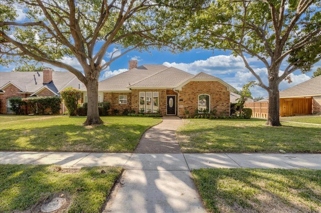 Honey, stop the car!  EXCEPTIONAL RENOVATED SINGLE-STORY HOME WITH DESIGNER FINISHES THROUGHOUT! Discover modern elegance and thoughtful design in this beautifully reimagined 3-bedroom, 2.5-bath Plano home offering 1,912 square feet, a dedicated home office, and NO HOA! From the moment you enter, soaring ceilings, abundant natural light, gorgeous wide-plank waterproof flooring, smooth Level 5 walls, and sophisticated designer lighting create an inviting atmosphere. A striking double-sided fireplace adds architectural character to the spacious living and dining areas, while the flowing floor plan offers an ideal setting for everyday living and entertaining.The stunning chef-inspired kitchen showcases beautiful custom cabinetry, quartz countertops, a designer backsplash, premium Bosch appliances, a Sharp microwave drawer, and a professional-style workstation sink. The luxurious primary suite is a true retreat, featuring a spectacular spa-inspired bathroom with a freestanding soaking tub, frameless glass shower, elegant brass fixtures, custom quartz vanity tops, and a skylight that fills the space with natural light.A private home office with French doors provides wonderful flexibility for working from home or pursuing favorite hobbies. Additional improvements include ENERGY STAR windows, modern LED lighting, upgraded doors and fixtures, and beautifully coordinated finishes throughout.Outside, enjoy a covered patio overlooking a refreshed backyard with new St. Augustine sod, landscaped flowerbeds, updated fencing, and a Wi-Fi-enabled irrigation system. Conveniently situated in an established Plano neighborhood, this exceptional home combines the appeal of modern luxury with the comfort and convenience of single-story living. Beautifully finished, thoughtfully designed, and ready to impress!
