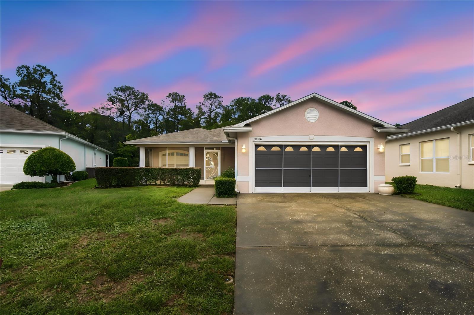 Welcome to 11508 Bloomington Ct in the Cross Creek neighborhood of Summertree — a desirable gated 55+ active-adult community in New Port Richey.This well-maintained single-story 3-bedroom, 2-bathroom home offers approximately 1,590 sq ft of living space (per floor plan; garage and screened porch excluded), a new roof, and an attached 2-car garage. The open layout features hardwood flooring in the main living and dining areas, a bright kitchen with white cabinetry, a double sink, and a breakfast nook, plus tile flooring in the kitchen and baths. The split-bedroom design provides privacy, with a spacious primary suite and two additional bedrooms (carpeted, with ceiling fans). A screened porch extends the living space outdoors.The property backs to a serene preserve setting with water views—mature trees, a peaceful pond or canal, and natural surroundings ideal for wildlife watching and quiet outdoor enjoyment. Inside and out, the home is thoughtfully maintained and move-in ready.Summertree (Cross Creek) delivers low-maintenance living with access to community amenities including a clubhouse, heated pool and spa, fitness center, tennis/pickleball, shuffleboard, billiards, and a 9-hole executive golf course. Residents also enjoy convenient proximity to shopping, dining, medical facilities, and Gulf Coast attractions.This is a rare opportunity for comfortable, low-maintenance Florida living in a sought-after 55+ community with a tranquil natural backdrop. Schedule your private showing today.