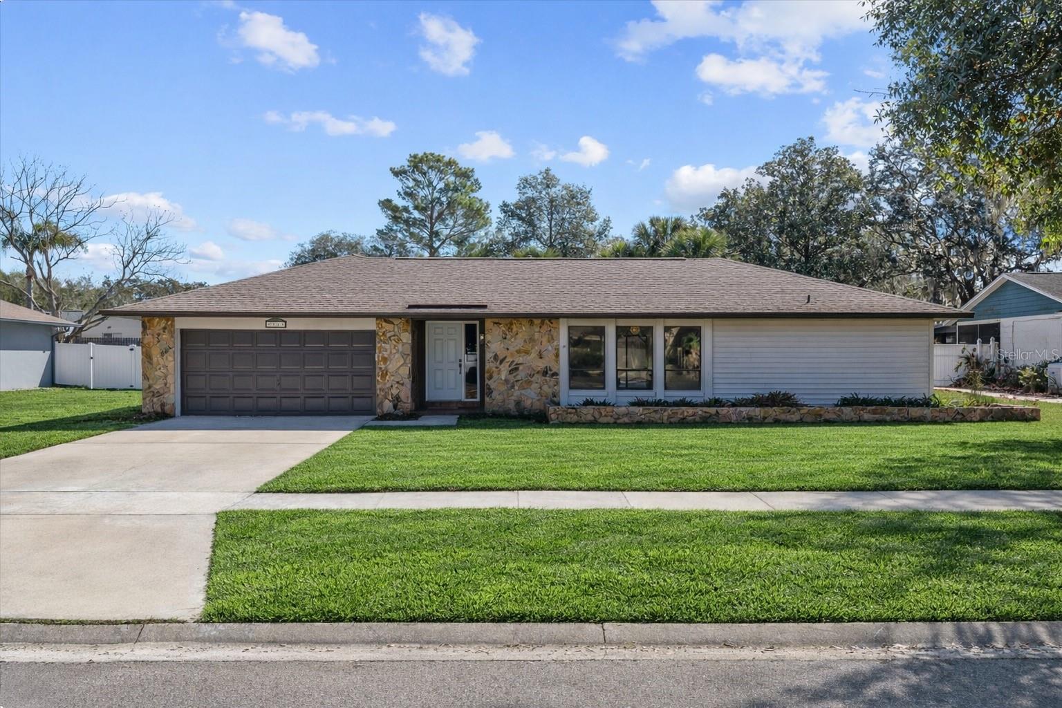 One or more photo(s) has been virtually staged. PUT A BOW ON IT! Absolutely stunning block home in an unbeatable school district. Arbor Ridge k-8 Magnet Charter school recognized as a "Magnet School of Distinction" and that feeds you right into amazing Winter Park High School! This is your conveniently located Orlando dream home with NO HOA DUES! Get anywhere in the city with expedited connectivity to SR-417 and SR-408. There is nothing not to like about this STUNNER. Fully loaded and newly renovated with quality materials and finishes. Designed to outlast any "trends" and give you that timeless feel within a split floor plan that provides everyday ease. Two separate sets sliding glass doors with views to your sparkling pool oasis complete with brand new tilework & surface. Extensive pool revitalization to take you into a happy future of enjoyment.  Custom trim work, tons of natural light, and a modern materials & fixtures bring heightened livability. Two large living spaces. Butcher block breakfast bar AND an informal granite barter provide full extension of the kitchen space for entertaining, eating, and relaxing. A primary bathroom to drool over, with a very large walk-in closet. You are within minutes of Orlando's greatest and most sought-after food and beverage spots, Michelin star and recommendation locations. You absolutely must see this to believe it. Chef's kiss!