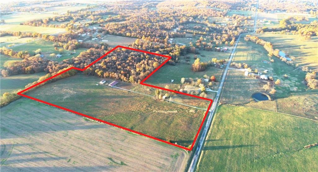 Country Home on 30 Acres – Just South of El Dorado Springs!
Just over 2 miles south of El Dorado Springs city limits on a paved road, this energy-efficient earth contact home offers peaceful country living and ample square footage. Built in 2007, the 1,920 sq ft residence features 3 spacious bedrooms—each with large closets—2 full bathrooms, a generous living room, a utility room, and an open kitchen/dining area perfect for gatherings. The kitchen also showcases a gas oven/range, dishwasher, microwave, and refrigerator. The washer and dryer are negotiable. 
Enjoy the outdoors from the impressive 9’x84’ full-length front porch and the charm of wood log siding. There is a long-distance view to the horizon looking to the east of the home.  The home is equipped with propane heat and central HVAC for year-round comfort and efficiency. 
The property also includes a 30’x40’ shop with concrete floors, electricity, and a 10’x9’ overhead bay door—ideal for hobbies, storage, or a workshop. The attached 2-car garage (19’x29’) adds convenience and additional space.
The 30 acres of land is approximately 20 acres open and 10 acres wooded.  This property offers endless opportunities—pasture for livestock or hay production, and timber for hunting or recreation.
If you’re looking for a private, move-in ready country home with acreage, this one checks all the boxes! Fiber internet is available at this property! Country homes like this generally don’t last long on the market, so schedule your private tour of this property today!