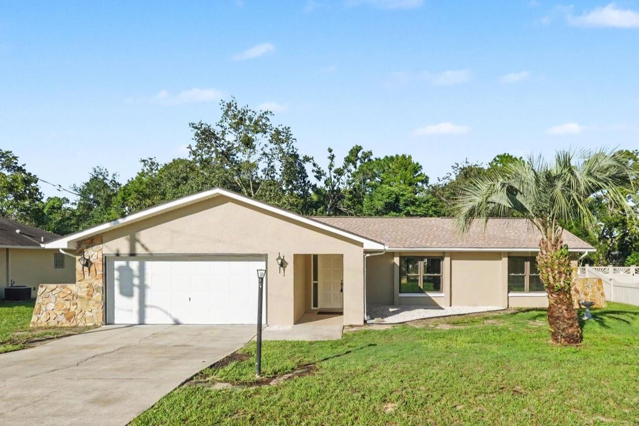 *************************BEST DEAL ON THE MARKET AND WILL NOT LAST!!!!********************************************Completely and Professionally remodeled inside and outThis beautifully designed modern/traditional 3-bedroom, 2-full bath and 2 car garage home boasts many extras.Including cathedral ceilings, modern kitchen with new cabinets, granite counters withpeninsula, stainless hood and stainless appliances. The high-end finishes flowthroughout the house and into the beautifully updated bathrooms with glass mosaic tileinserts, modern rain shower with body jets and a water wand. The Primary bedroom hasa private bath with large walk-in closet. The home has all new upgraded doors,hardware and trim along with beautiful 100% waterproof luxury vinyl floors throughoutthe entire house that really enhance the warm atmosphere of this home. Theprofessional remodeling of this house was not just a face lift. There is a brand-newenergy efficient Lennox HVAC unit. The house has all updated switches, outlets, LEDlight fixtures, and fans. The plumbing has also been updated throughout with newvalves, hoses, sinks and fixtures. This house does not disappoint on curb appeal either.The total remodel of this house includes brand new roof, new paint, new plant beds, andfreshly seeded yard. The rear yard has a beautiful large Lanai completely re-done withnew screens, screen door and LED fans making for an excellent outdoor space.This is a gorgeous house in a great family neighborhood in Spring HillIt is move in ready