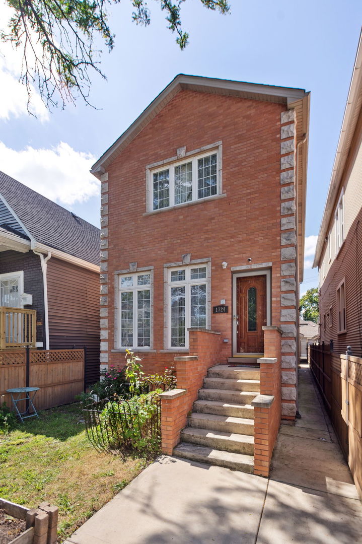 A rare opportunity to own a house that is both newer AND in an up-and-coming, rapidly developing area. Unlike most houses in the region that were built over a century ago, this is an all-brick single family built in 2011 on a full sized lot. Located in hot Hermosa/Humboldt Park which is next door to Chicago's popular neighborhood Logan Square and right along the 606 Trail, you are just steps away from fine-dining, trendy cocktail bars, farmer's market and outdoor leisure and exercise. This three-level house has an abundance of indoor and outdoor space. A front yard, back deck, and balcony outside. Inside, the first floor features a spacious living room, dining room, half bathroom, family room, and kitchen. The chef's kitchen features stainless steel appliances, 42" cabinets, endless granite counter space, and a walk-in pantry. The second floor features 3 bedrooms and 2 full bathrooms. The primary bedroom is big and bright with vaulted ceilings, walk-in closet, balcony, and bathroom with a dual vanity, standing shower, and jet-streamed jacuzzi tub. The lower level features a massive family room perfect for entertaining friends and family with a fireplace, one bedroom, full bath, and large-sized laundry room. Other features include bamboo flooring, french style windows, dual-zoned heating and cooling, two-car garage, fully fenced in and doggy-proofed enclosed property with a front grass area for your dogs, and gated entry. New Roof & Water Heater 2025