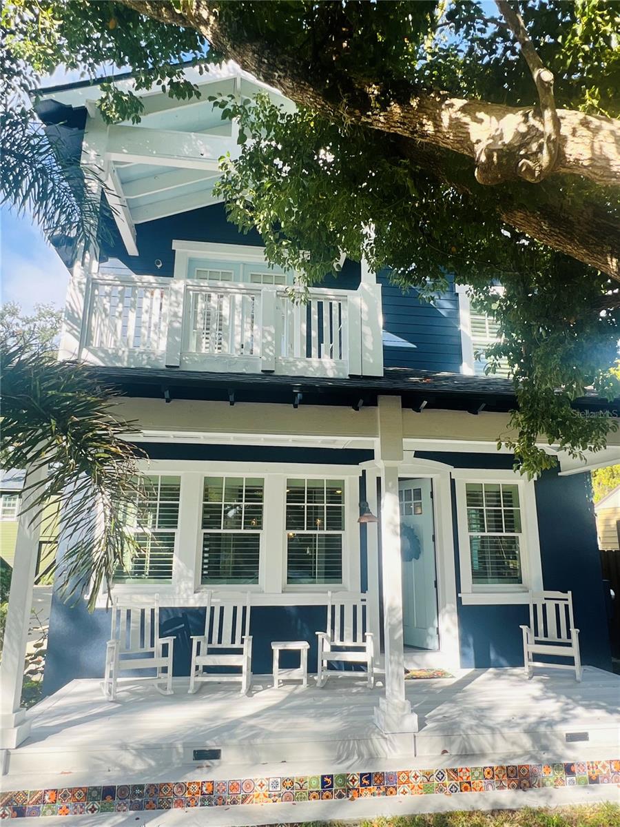 One or more photo(s) has been virtually staged. SELLER NOW OFFERING OWNER FINANCING *** ALSO *** $50,000 CREDIT TO BUYER ON RECEIPT OF FULL PRICE CONTRACT!!This Property appraised for $1,690,000! BACK ON MARKET after 70 days with NEWLY UPDATED INTERIOR! The buyers provided feedback and the seller listened!! Check out the new updated wooden acoustic paneling, freshly hung and painted drywall and stylish wallpaper on the lower level. Over $40k spent.Nestled in the heart of the charming and historic Eola Heights neighborhood of Orlando, this brand-new Colonial-style residence is a perfect fit among the tree-lined streets and timeless architecture that define the area. At first glance, the classic exterior — complete with a symmetrical façade, shuttered windows, and a broad front porch—blends harmoniously with its distinguished neighbors. This modern-industrial 4-bedroom, 3.5-bath residence is a bold and brilliant departure from the traditional. Spanning 3,230 square feet, the home is an industrial-chic masterpiece where artistry meets function at every turn. The innovative use of materials and meticulous craftsmanship, creates a one-of-a-kind interior that stuns and inspires.From the moment you walk through the door, you’re greeted by custom herringbone hardwood floors that flow effortlessly through the main living spaces, setting the tone for the visual journey ahead. Exposed block, reclaimed wood beams, and raw textures seamlessly intertwine with vaulted 12ft ceilings to create a space that feels both expansive and intimate. The open-concept floor plan is framed by dramatic lines and layers of thoughtfully integrated custom carpentry, from built-in shelving to bespoke trim details that elevate every corner of the home.The kitchen is an entertainer’s dream and a chef’s playground, outfitted with premium ‘CAFE’ appliances, brushed metal fixtures, and rich cabinetry that complements the home’s industrial aesthetic. A generous island anchors the space, offering ample seating and a seamless transition to the adjacent dining and living areas—ideal for modern living and elegant entertaining.The primary suite is a true retreat, complete with a spacious his and hers walk-in closets lined in custom millwork and a luxurious spa-like en suite bath with artisanal tile work and high-end finishes. Savor your morning coffee on the private primary suite balcony. Each additional bedroom is uniquely designed, offering flexibility for family, guests, or creative workspaces. The upstairs enjoys abundant natural light and share access to beautifully appointed bathrooms with bold design touches.Tucked away at the rear of the property, above the detached 2-car garage, is a fully equipped 1-bedroom, 1-bath Accessory Dwelling Unit (ADU)—a perfect option for guests, in-laws, or rental income. The ADU reflects the same commitment to style and quality as the main house, offering privacy and comfort in a compact, well-designed space. Other 1/1 ADU's in the area are renting for between $1500-$1800/month.From the fine architectural detail to the thoughtfully curated finishes, this home is an extraordinary example of what happens when classic charm meets modern vision. With a location that puts you minutes from Lake Eola Park, Thornton Park, and downtown Orlando’s cultural and dining scenes.HUGE OPPORTUNITY! Don’t miss your chance to gain almost $400,000 in equity and own this eclectic masterpiece in one of Orlando’s most iconic neighborhoods. Schedule your private showing today.