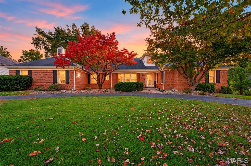 Welcome to this stunning all-brick residence nestled in the highly desirable Williamsburg Green subdivision, a beautiful, established neighborhood in the heart of Chesterfield! Situated on nearly half an acre, this exceptional 4-bedroom, 3.5-bath home offers timeless elegance, generous living spaces, and an incredible backyard retreat. Step inside to discover an abundance of natural light, fresh paint, updated lighting throughout, and an inviting layout designed for both everyday living and effortless entertaining. A dedicated home office and convenient main-floor laundry add to the home’s thoughtful design. The expansive walkout lower level is truly an entertainer’s dream, featuring an impressive family room, spacious bar, additional bedroom, two versatile sleeping areas or offices, and a full bath. Step outside to your own private oasis, complete with a beautiful inground pool, relaxing hot tub, and expansive fenced backyard offering endless opportunities for outdoor entertaining. Located within the highly rated Rockwood School District, this exceptional property combines an established, picturesque neighborhood setting with convenient access to Clarkson Road, Highway 40/64, shopping, dining, parks, and everything Chesterfield has to offer. An extraordinary opportunity to enjoy spacious living and timeless appeal in one of the area’s most desirable locations!