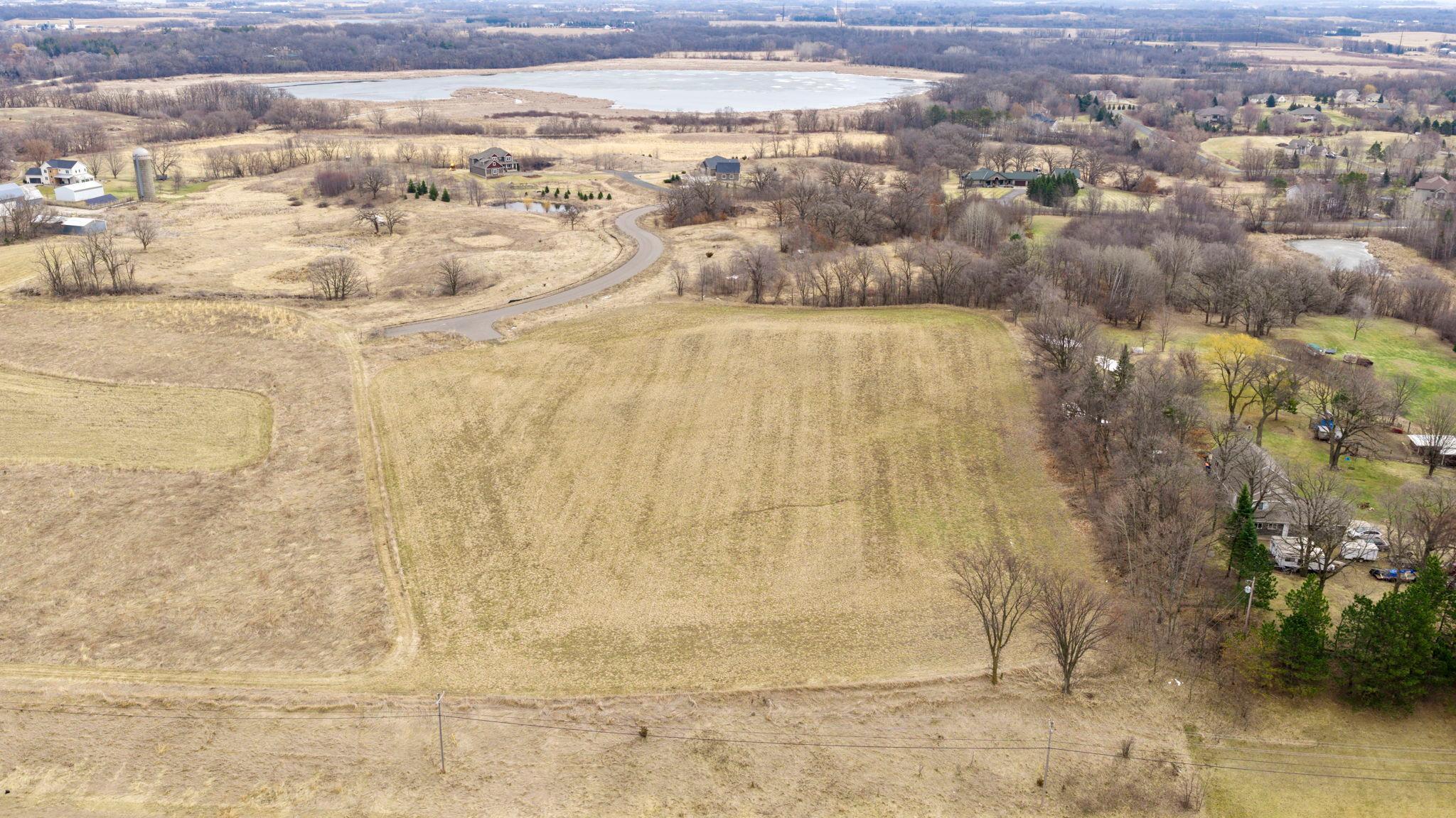Discover stunning acreage lots in Rice Lake Estates, featuring gently rolling terrain and serene countryside views—all tucked away on a quiet, secluded street. Enjoy the perfect balance of privacy and community, with expansive open land surrounding the neighborhood. Two walkout lots are available, each offering over 2.5 acres—perfect for building your dream home. Conveniently located just minutes from I-35W, with easy access to multiple lakes, parks, golf courses and downtown Lakeville’s dining and shopping. Commuting is a breeze with a short drive to Minneapolis–St. Paul, the Mall of America, and MSP Airport. Located within the highly regarded Lakeville School District 194. Bring your own builder or partner with ours - Stone Cottage Construction.