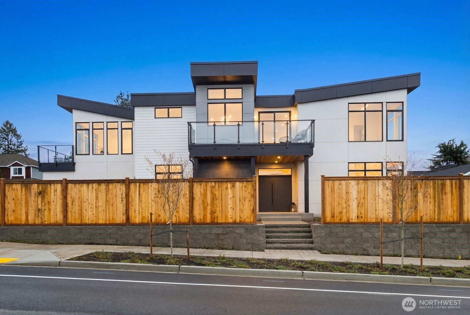 Experience elevated living in this brand-new home nestled in the highly desirable Richmond Beach community, offering stunning mountain and sound views. The thoughtfully designed main level features an expansive open-concept layout, complete with a gourmet kitchen showcasing stainless steel appliances, a spacious center island with seating, a dedicated dining area, and an elegant front living room with a cozy gas fireplace.    Engineered hardwood flooring flows throughout, complemented by a convenient walk-in utility room. Upstairs, you’ll find three generously sized bedrooms with walk in closets, including a luxurious primary suite that serves as a private retreat. Enjoy breathtaking views, a walk-in closet, and a spa-inspired five-piece bath with a soaking tub.    Step outside to a beautifully fenced yard, perfect for relaxing or entertaining, and take in the scenery from the two view decks. A two-car garage completes this exceptional home.