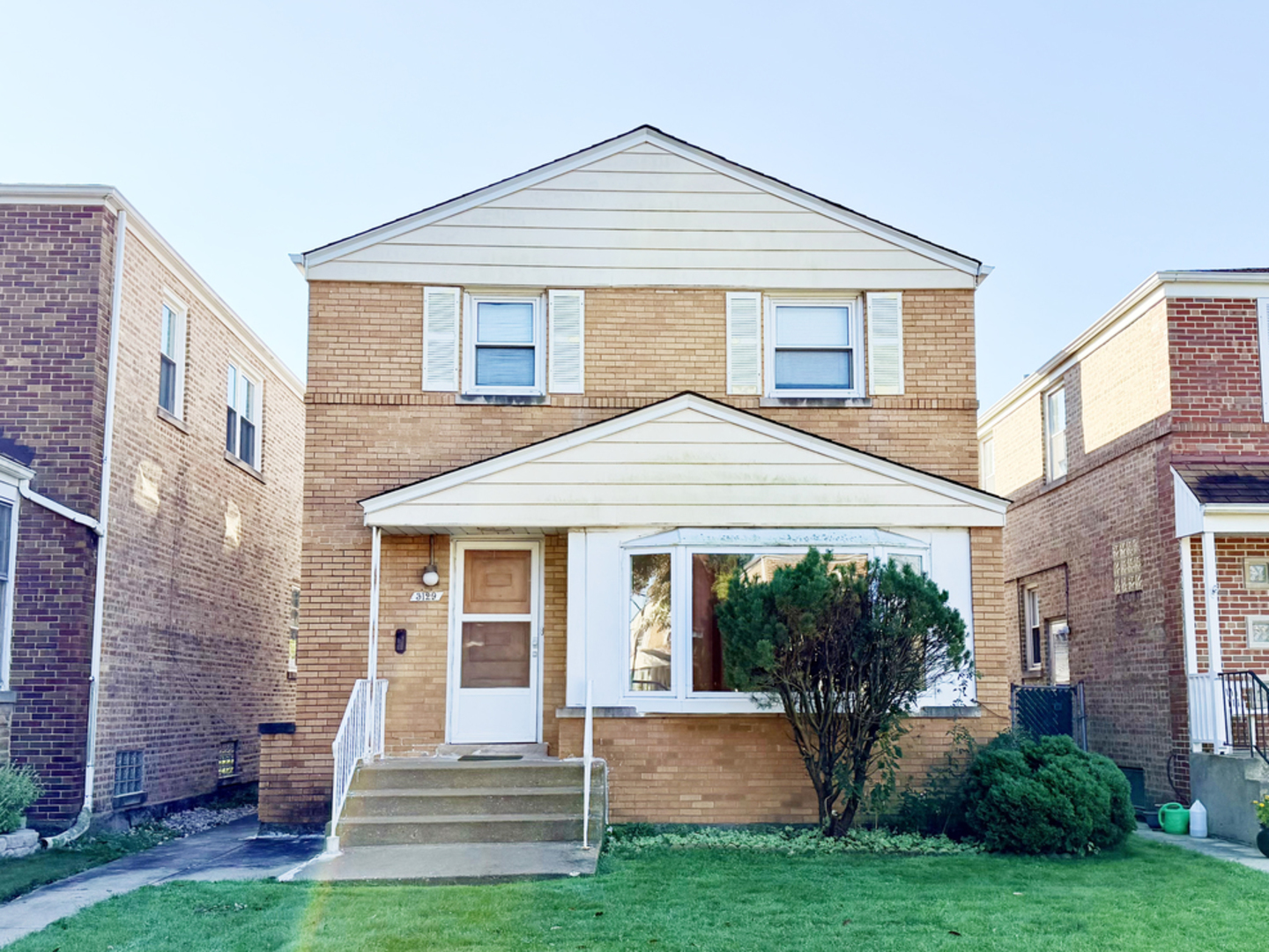 Charming brick Georgian in the heart of West Ridge. This 3 bedroom, 2 bath home offers about 1,433 square feet of living space (not including basement) on a 30 x 125 lot. Sun-filled living room with a bay window, formal dining room, and a kitchen with a breakfast bar. Hardwood floors, central air, and a full finished basement with a spacious family room and a large laundry and utility room give everyone room to spread out. Step out to the deck and the large fenced backyard. There is no garage, but the home has rear alley access, so a buyer can build a garage in the future, subject to City of Chicago permits. Conveniently located near shopping and CTA transportation, with easy access to I-94, Skokie, Lincolnwood, and Evanston. Sold AS-IS. A solid home with great bones and room to make it your own.