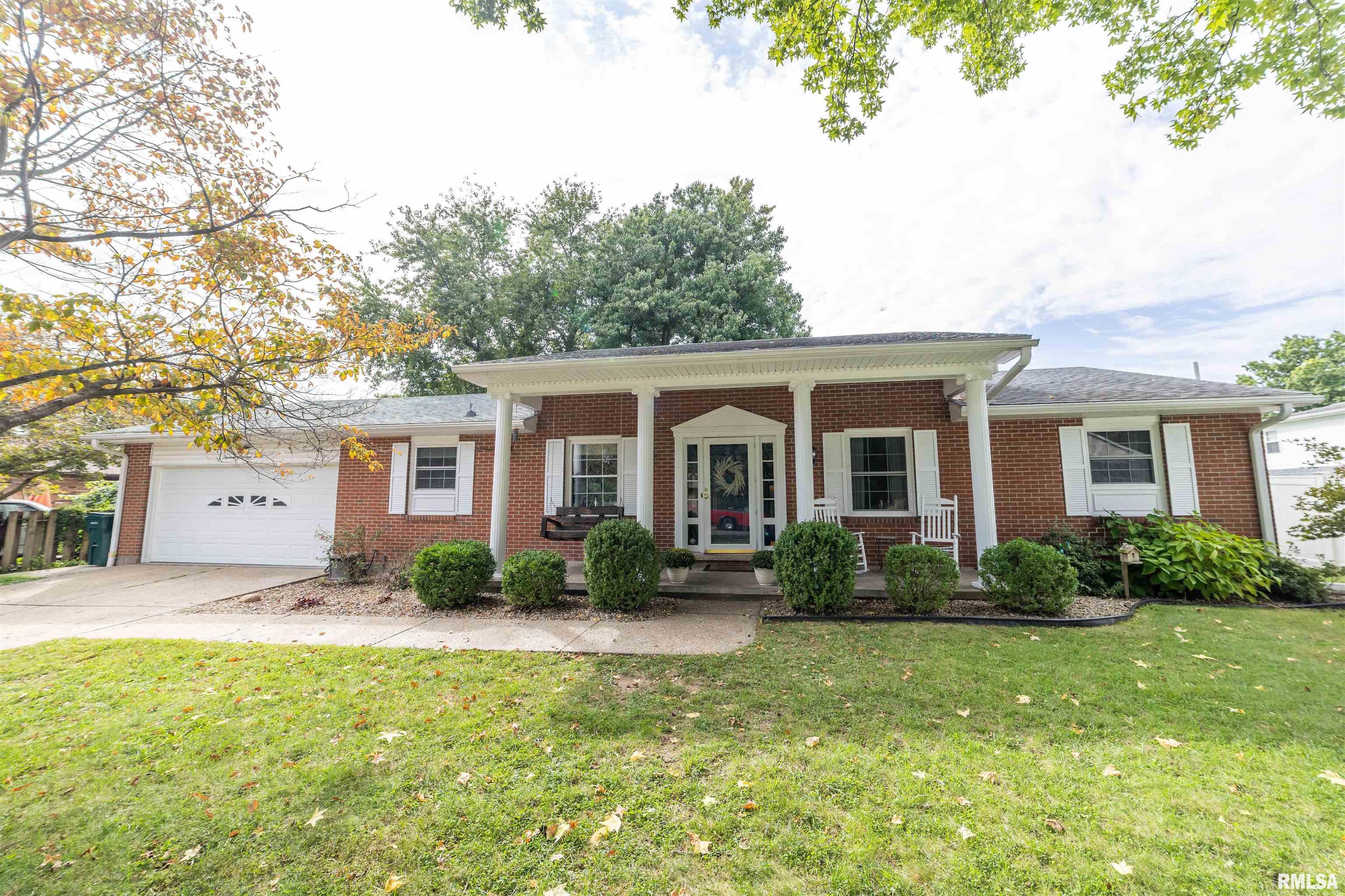 Spacious 3-bedroom (used as 5-bedroom) 3-bath brick ranch offering an abundance of finished living space in a desirable Quincy neighborhood! Beautiful hardwood floors, a sunroom and a gas fireplace add warmth and character to the main level. The full finished basement provides even more room to enjoy with a large living area, wet bar and second gas fireplace. Outside, enjoy a vinyl privacy-fenced backyard and attached garage. Many updates have been completed over time inside and out.  With flexible living spaces on both levels and numerous desirable features, 1312 S 29th Street has plenty to offer!