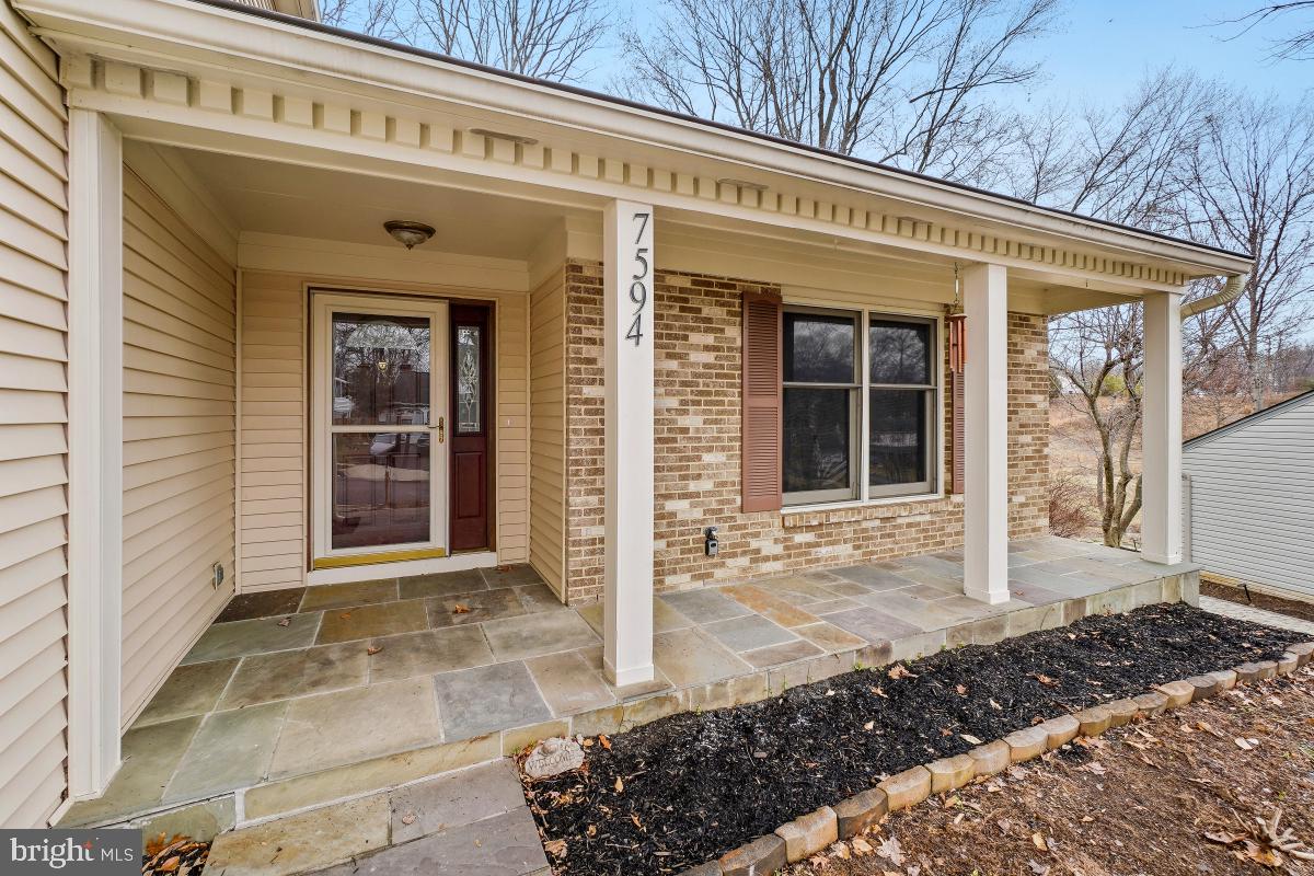 Price reduced! This spacious and beautifully updated 4‑bedroom, 2.5‑bath home offers comfort, style, and privacy on a wooded lot in the sought‑after Terra Grande neighborhood. A charming front porch welcomes you inside, where the main level features generous living and dining rooms, along with a cozy family room with a fireplace. The family room opens to a large screened sunroom overlooking the serene, tree‑lined backyard with mature landscaping—an ideal setting for relaxing or entertaining.A second screened sunroom provides even more year‑round outdoor enjoyment and flexible living space. The well‑maintained kitchen offers ample storage and functionality, making everyday cooking and hosting gatherings effortless.Upstairs, all four bedrooms feature brand‑new carpet. The spacious primary suite easily accommodates a king‑sized bed and includes an oversized walk‑in closet and a luxurious en‑suite bath. Three additional bedrooms are generously sized and share a well‑appointed hall bathroom. Fresh paint throughout the home adds to the move‑in‑ready appeal.The walk‑out basement offers a large recreation area with a wet bar and direct access to a huge patio—ideal for outdoor living and entertaining. A two‑car garage provides convenience and additional storage.