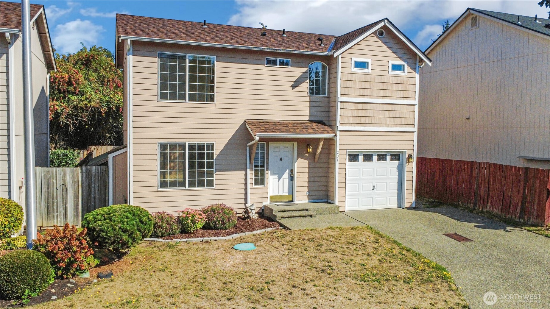 This is the kind of home that makes it easy to picture yourself settling in and making it your own. Freshly painted and featuring new flooring throughout, this 3-bedroom, 2.5-bath Tacoma home offers nearly 1,200 SqFt of living space that's been professionally cleaned and thoughtfully prepared for its next owner. The comfortable floor plan gives you room to enjoy everyday life, whether that means relaxing at home in front of the cozy gas fireplace, hosting friends, or simply having a little more space to grow. This home features great storage options, dining room, ceiling fans, large picture windows, great sized fenced backyard, oversized driveway, and an attached garage for convenience. As a first-time homebuyer or moving up, this is an opportunity to skip the overwhelming list of projects and start enjoying homeownership right away. A completed pre-inspection offers added peace of mind, while the convenient location puts major freeways, shopping, restaurants, and everyday amenities just minutes away. If you've been waiting for a home that feels fresh, comfortable, and ready for your next chapter, come see if this Tacoma home is the one you've been looking for.