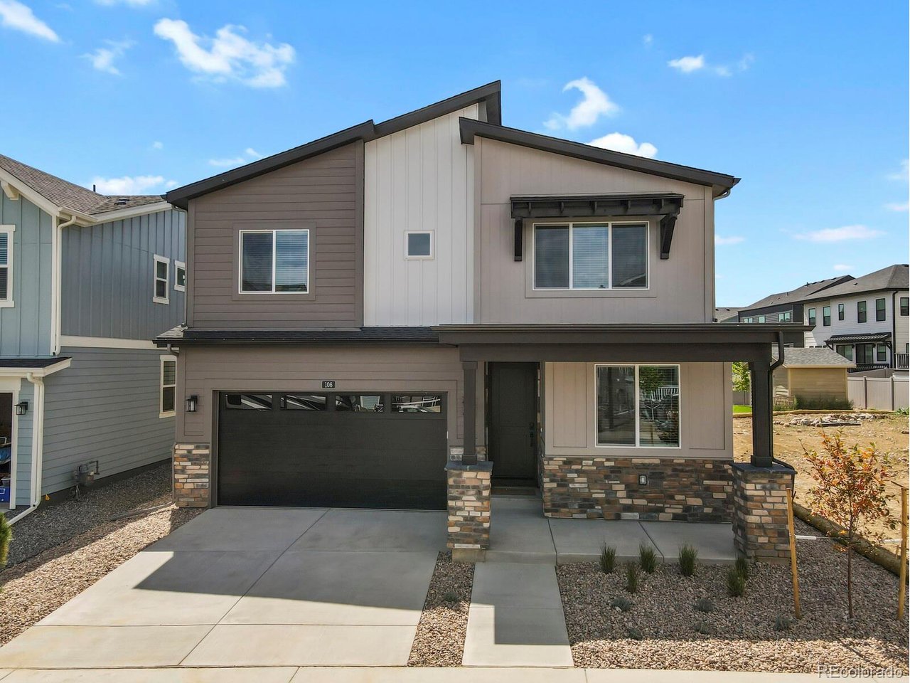 This immaculate luxury new build elevates the concept of a new beginning to extraordinary heights. Featuring a bright and airy design, the home boasts generously sized bedrooms, soaring vaulted ceilings, elegant luxury vinyl flooring, and exquisite quartz countertops, highlighted by a magnificent kitchen island surrounded by custom cabinetry that provides plentiful storage and a convenient walk-in pantry. Two en suite bedrooms upstairs, each with its own private attached bathroom. Alongside the 5 spacious bedrooms, a finished bonus room in the basement serves as an ideal space for a gym or media room, while the partially unfinished basement enhances your storage options. Small private yard. With low-maintenance landscaping, you'll have more time to enjoy your passions. The fully finished 2-car garage adds both convenience and additional storage, completing a home that is truly ready for you to move in. Bright and well-designed, this home offers everything you desire without the delays or extra expenses associated with new construction. There is NO HOA, yet you can enjoy access to both swimming pools in Rock Creek and the Recreation Center. Its fantastic location ensures easy access to nearby playgrounds, parks, trails, top-rated schools, and shopping options like Costco and Whole Foods, as well as quick access to both Boulder and Denver, all while providing exceptional access to hiking and biking trails with breathtaking views of the Flatirons. The home offers ample space, making it ideal for accommodating several roommates. There is no HOA or Special Taxing/Metro District, which will help save significantly on costs. NOTE: 2025 Property taxes are for land only and we will be re-assessed.