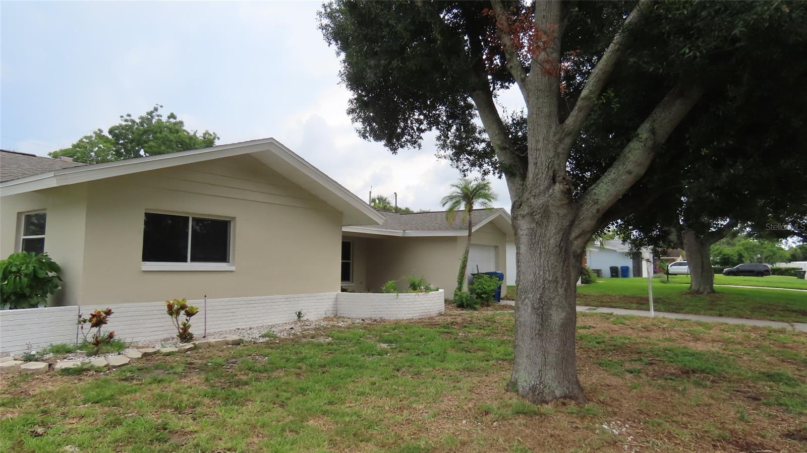 A new roof, fresh exterior paint and a location close to Gulf beaches provide a strong starting point for this Largo pool home’s next chapter. Currently arranged as a three-bedroom, three-bathroom home with a one-car garage, the property offers an opportunity to complete a substantial interior renovation and create spaces that reflect your own style. The unfinished interior offers an opportunity to plan a renovation around your own preferences for cabinetry, flooring, fixtures and finishes, with buyers to evaluate any additional preparation and work needed. A living and dining room combination provides a central gathering space, while the kitchen area offers possibilities for a personalized design. A Florida room adds flexibility for an additional sitting area, hobbies or entertaining once renovated, and there is also an inside laundry room.Outside, the fenced yard and pool with a screened enclosure offer the foundation for an inviting outdoor retreat. With restoration and landscaping, this area could become a welcoming setting for outdoor dining, relaxing and enjoying time around the pool. Located near Indian Rocks Road and Walsingham Road, the home offers convenient access to grocery stores, shopping, casual dining and everyday services, with Indian Rocks Beach a short drive away for beach days and Gulf sunsets. Anona Elementary School is nearby, and the Florida Botanical Gardens, Heritage Village and Walsingham Park provide additional options for exploring local history, gardens and outdoor recreation. Bring your renovation plans and consider the possibilities of combining a personalized interior with an existing pool, fenced yard and convenient coastal location.The property requires substantial renovation and is being sold as-is. Buyers and agents should verify bedroom and bathroom configuration, square footage, permits, school zoning, pool condition and all renovation requirements with the appropriate municipality. All information is believed to be accurate but is not guaranteed. Buyers and agents to verify all facts/information pertinent to their purchase decision. No utilities will be activated.