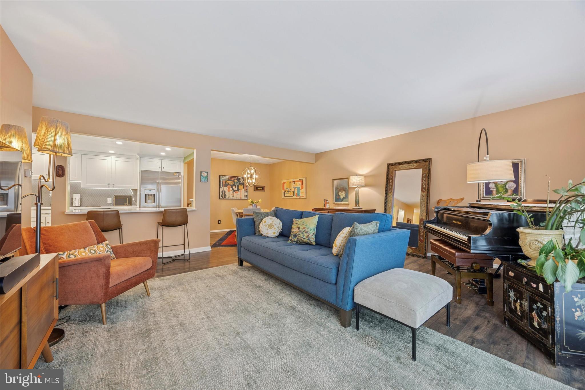 Welcome home to the highly sought-after Glenhardie community—This bright and inviting 2-bedroom, 2-bath entry-level condo masterfully combines everyday convenience with refined comfort and thoughtful modern updates. Step onto your own private walkway, leading to a charming covered patio and seamless sliding glass door entry. Inside, discover a freshly painted, open-concept living area bathed in natural light, anchored by a stylishly updated kitchen featuring sleek stainless steel appliances—including a premium new Bosch dishwasher. Rich engineered wood flooring flows wall-to-wall, creating a warm, upscale foundation throughout. Set the ideal ambiance with dimmable lighting—soft and cozy for movie nights, crisp and bright for entertaining, or perfectly tuned for productive work-from-home days. Upgraded window treatments elevate the experience further: sleek motorized roller shades on the patio doors offer effortless light and privacy control at the touch of a remote, while both bedrooms boast custom 2-inch Venetian blinds for a polished, tailored look. The generous primary suite impresses with a spacious walk-in closet that opens directly into a beautifully renovated en-suite bath, complete with chic porcelain tile flooring. Outside your door lies unbeatable convenience: just minutes from an exceptional array of restaurants, world-class shopping at the renowned King of Prussia Mall, the vibrant Town Center, and the nearby Gateway Shopping Center. Residents have the exclusive option to join the adjacent Glenhardie Country Club (at an additional reduced rate), unlocking a premier resort-style lifestyle with golf, tennis courts, swimming pool, and a vibrant calendar of social events—all steps from home. Enjoy low  association fees at just $418/mo, covering services including water, sewer, trash removal, and snow removal.Abundant closet space throughout the unit, plus your own dedicated storage locker in the building for organization and extra convenience. Commutes are effortless with direct access to major arteries including Routes 202, 76, 276, 422, and the PA Turnpike. The nearby Wayne Train Station (on the SEPTA Paoli/Thorndale Line) provides a quick, stress-free ride straight to Philadelphia’s Center City.Nestled in the highly acclaimed Tredyffrin-Easttown School District—This location truly combines suburban ease with exceptional connectivity—perfect for work, play, and everything in between!