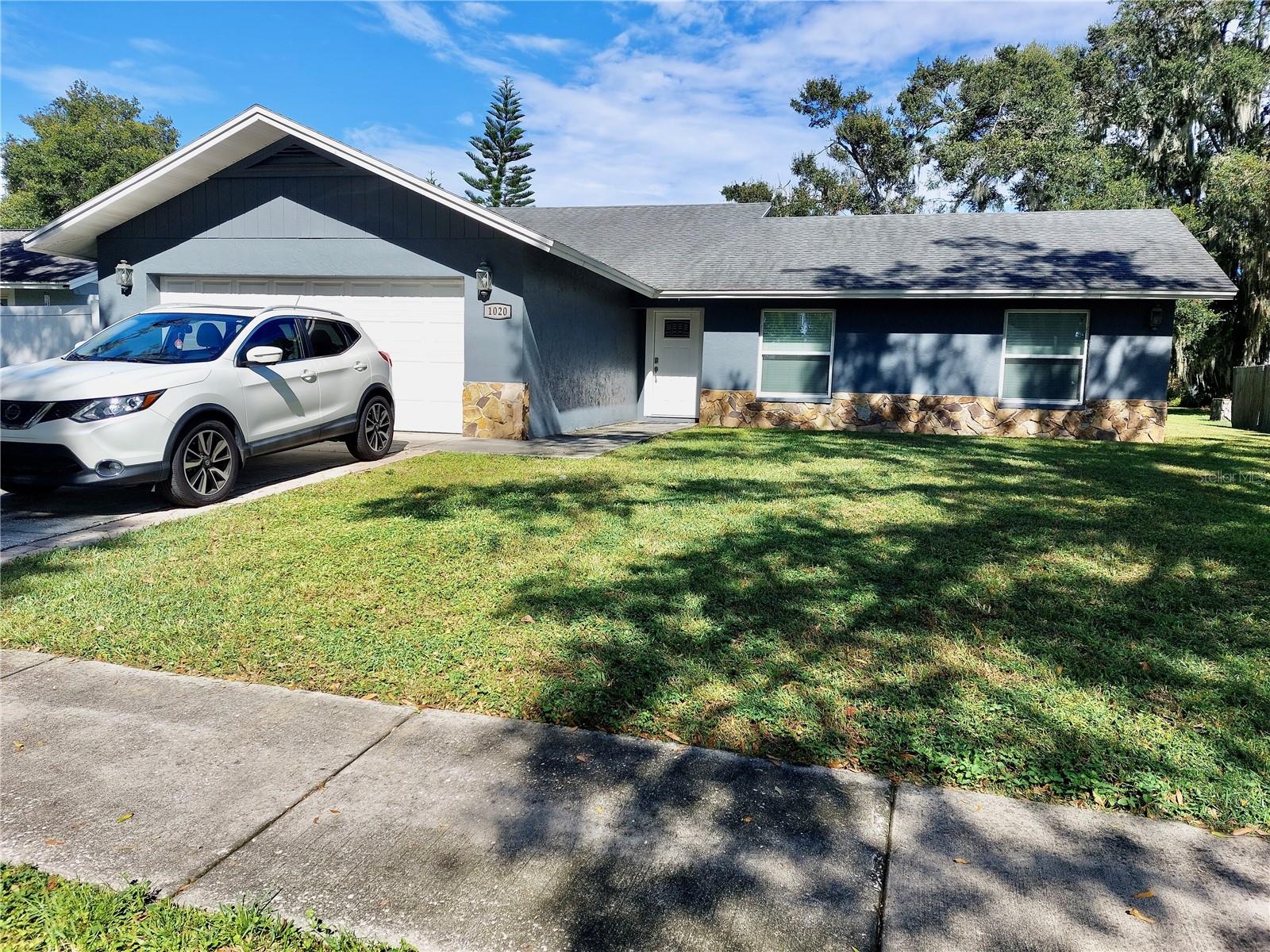 Charming 3 Bed, 2 Bath Home in the Heart of Plant City! Welcome to this beautifully maintained home perfectly located just minutes from major shopping centers, popular restaurants, and grocery stores. Featuring an open floor plan with a spacious living room, this home is ideal for both relaxing and entertaining. Enjoy easy maintenance with tile flooring throughout the main living areas and brand-new carpet in all three bedrooms for added comfort. The updated kitchen boasts modern finishes, while both bathrooms have been stylishly renovated for a fresh, contemporary feel. Step out back to a large screened-in porch—perfect for enjoying Florida evenings without the bugs! Whether you're a first-time buyer, growing family, or looking to downsize, this move-in-ready gem has it all. Don’t miss out on this fantastic opportunity in one of Plant City’s most convenient locations!