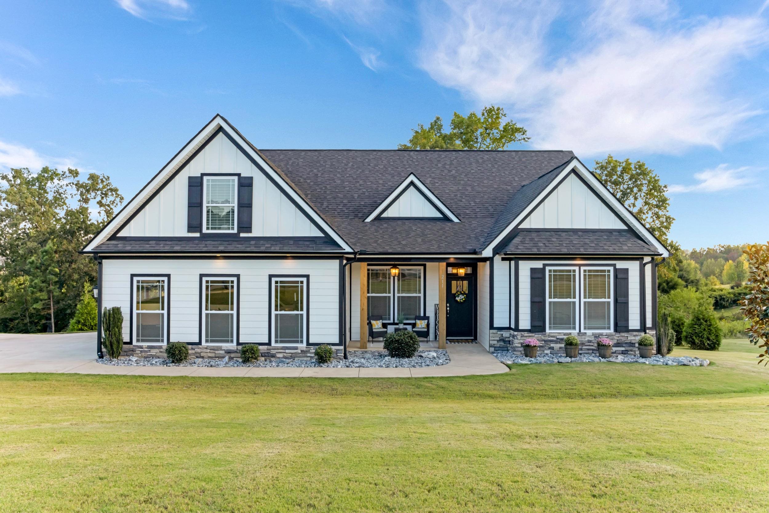 Welcome to this beautifully maintained 4-bedroom home located in a highly sought-after gated lakeside community. With thoughtful design, timeless finishes, and a setting that blends privacy with neighborhood amenities, this home is perfect for families looking for both comfort and convenience. Step inside to find wood flooring throughout all living areas and an inviting open-concept layout ideal for gatherings and everyday living. The luxury kitchen features granite countertops, a stylish tile backsplash, stainless steel appliances, and a cozy breakfast nook, making it the heart of the home. Crown molding and chair rail details add a touch of elegance to every room. The spacious master suite offers a peaceful retreat, complete with a tray ceiling, spa-like bathroom, and expansive closet space. Upstairs, you’ll find over 300 square feet of finished space above the garage — perfect for a 5th bedroom, playroom, office, or media room. Enjoy outdoor living on the partially covered back deck, which overlooks a private backyard and a shared pond on a lot just over 1 acre. A cleared path leads directly to the pond, providing a serene spot for fishing, relaxing, or exploring. This home is just a short walk or golf cart ride to the community dock, landing, and cabana, making lakeside fun and neighborhood gatherings part of your daily lifestyle. A  tall crawl space with vapor barrier and dehumidifier provides the perfect place to store all the lake toys. Built only 4 years ago and immaculately maintained, this property offers both modern amenities and peace of mind.