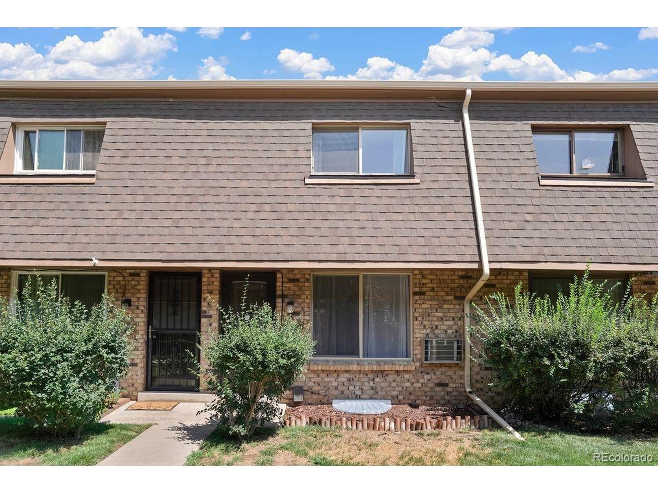 Turn-key and beautifully updated! This south-facing 2-bedroom, 2-bathroom townhome with a finished basement is nestled in the highly desirable Applewood area. Quality renovations include fresh interior paint, LVP composite flooring (with installation warranty), plush carpet with premium 1/2-inch padding, updated doors, light fixtures, ceiling fans, and a new front security door.The main level features a stunning kitchen outfitted with new cabinetry, quartz countertops, stylish hardware, sleek LVP flooring, sink, updated lighting, a pantry, and cozy bistro seating. Unwind in the living room complete with a new window, dedicated dining area, and coat closet. Step outside to your private, fully fenced 11x14 patio with direct access to the detached 2-car carport.Upstairs, find two spacious bedrooms sharing a full bath and a linen closet. The lower level offers a versatile partially finished basement-ideal for a media room or home theater-plus an unfinished utility room with laundry and ample extra storage.Prime central Lakewood location! Enjoy quick access to schools, shopping at Colorado Mills, Golden, the Federal Center, St. Anthony and Lutheran hospitals, and the Oak Street Light Rail station. Stroll just down the street to Quail Park for picnics and playground fun.