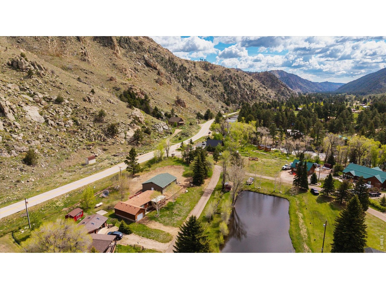 Motivated Seller! Cozy mountain cabin in Poudre City with 2 bedrooms, 2 bathrooms, and an attached, significantly oversized, 1-car garage. Totally updated and REMODELED home, plus this large lot features a NEW 1280sqft shop. This amazing year-round getaway has gorgeous views of canyon ridges, and overlooks a seasonal pond. The Poudre River is just yards away for fishing and enjoyment of the serene sounds and beauty. NEW shop has an overhead door for vehicle access, plus plenty of space for your toys, tools, projects & hobbies. Add a few of your finishing touches in the shop and convert it into roomy additional living spaces. House windows and furnace NEW in 2016. New electrical box and panels. Bathrooms in the house are completely remodeled, along with NEW lighting, drywall and modern texture throughout the home. Roofs have recently been inspected and are in great condition. Local options for restaurants, groceries and guest accommodations abound with the two most active, full-service resorts in the Upper Poudre under a mile away (Glen Echo Resort & Archer's Poudre River Resort). The Summit of Cameron Pass is only 28 miles and the Upper Poudre Community Center, chapel and fire station are about a mile up-stream. Chambers Lake, Long Draw Road, the Blue Lake Trailhead, Joe Wright Reservoir/Zimmerman Lake Trailhead, and many other popular hiking and fishing destinations are 20-26 miles up the canyon. Buyer and Buyer's Agent are responsible for verifying all listing details including, but not limited to square footage, acreage, road maintenance assoc., septic, well, flood zone, schools, etc.