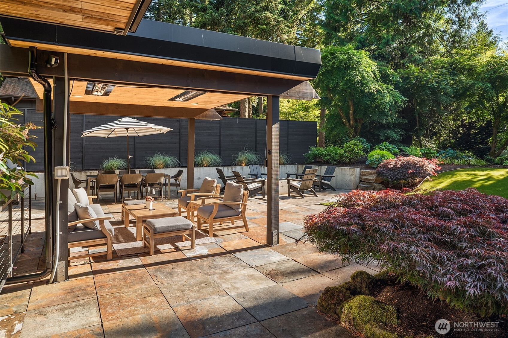 covered patio lounge with teak seating
