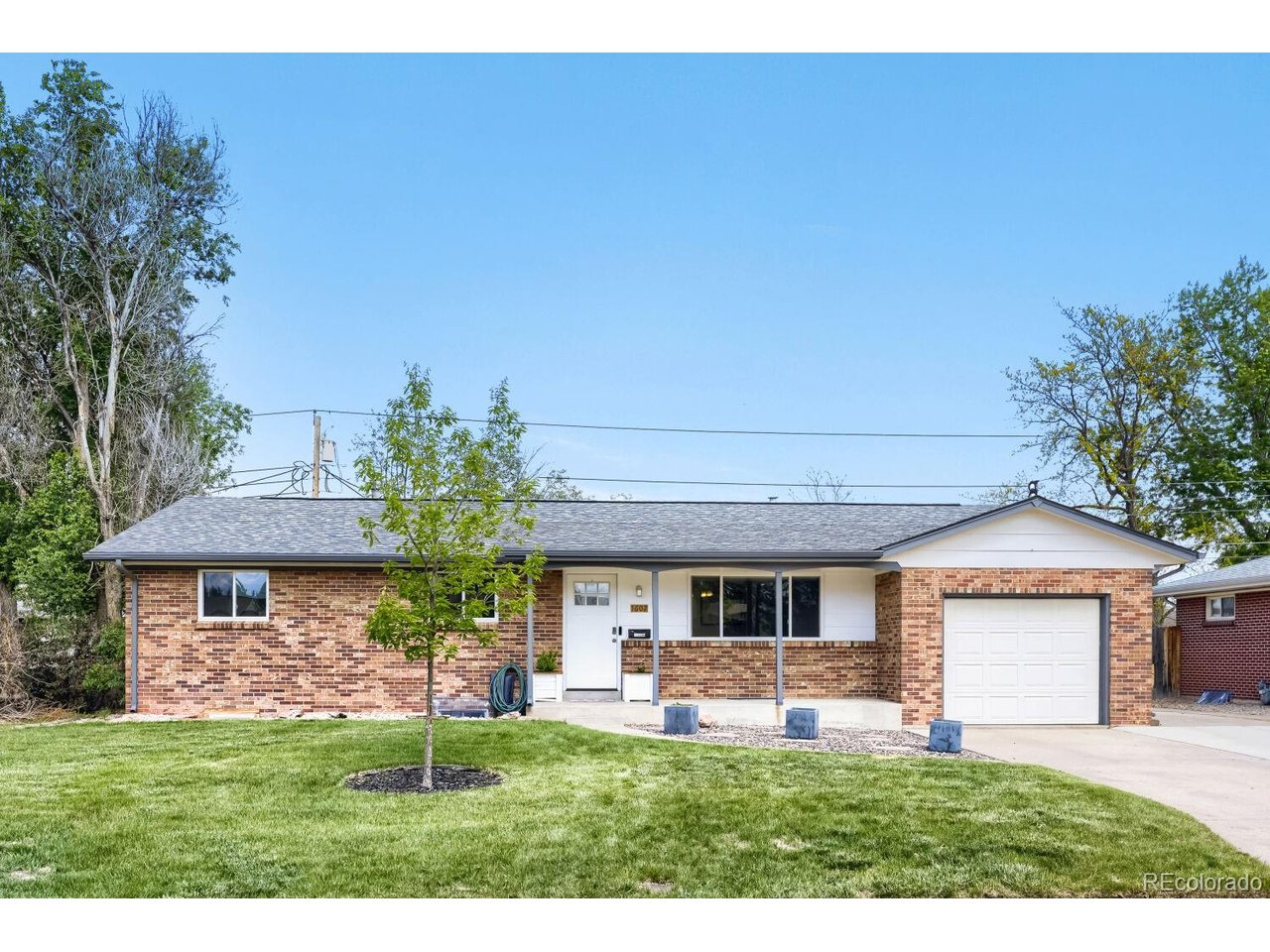 Welcome to this beautifully maintained ranch-style home in the desirable Cloverdale West neighborhood of Lakewood! Offering 5 bedrooms and 3 baths, this versatile property combines comfortable living with exceptional income potential thanks to the FULLY FINISHED BASEMENT COMPLETE WITH ITS OWN FULL KITCHEN, SPACIOUS FAMILY ROOM, LAUNDRY AREA, 2 BEDROOMS AND A 3/4 BATH - ideal for multi-generational living, guests, or rental opportunities. Step inside the main level and enjoy stylish LVP flooring and carpet throughout, creating a warm and inviting atmosphere. The bright living spaces are enhanced by newer windows on the main level that bring in abundant natural light while improving energy efficiency. The thoughtfully designed floor plan provides both functionality and comfort, making everyday living easy and enjoyable. The kitchen flows seamlessly into the eat-in area and outdoor areas, perfect for entertaining year-round. Relax under the covered patio or host gatherings in the additional outdoor entertaining space overlooking the fully fenced backyard. A sprinkler system in both the front and back yards helps maintain the mature landscaping with ease, while the storage shed provides extra room for tools and seasonal items. Car enthusiasts, hobbyists, and DIY enthusiasts will appreciate the oversized 1-car garage featuring built-in shelving and 220 electrical service. Major system updates provide peace of mind, including a furnace that is only 1 year old and a roof that is approximately 6 years old. Located in a convenient Lakewood location close to parks, shopping, dining, schools, and easy commuter access, this home offers flexibility, value, and opportunity all in one package. Whether you are searching for space to spread out, room for extended family, or a property with excellent rental potential, this exceptional Cloverdale West home is one you will not want to miss!