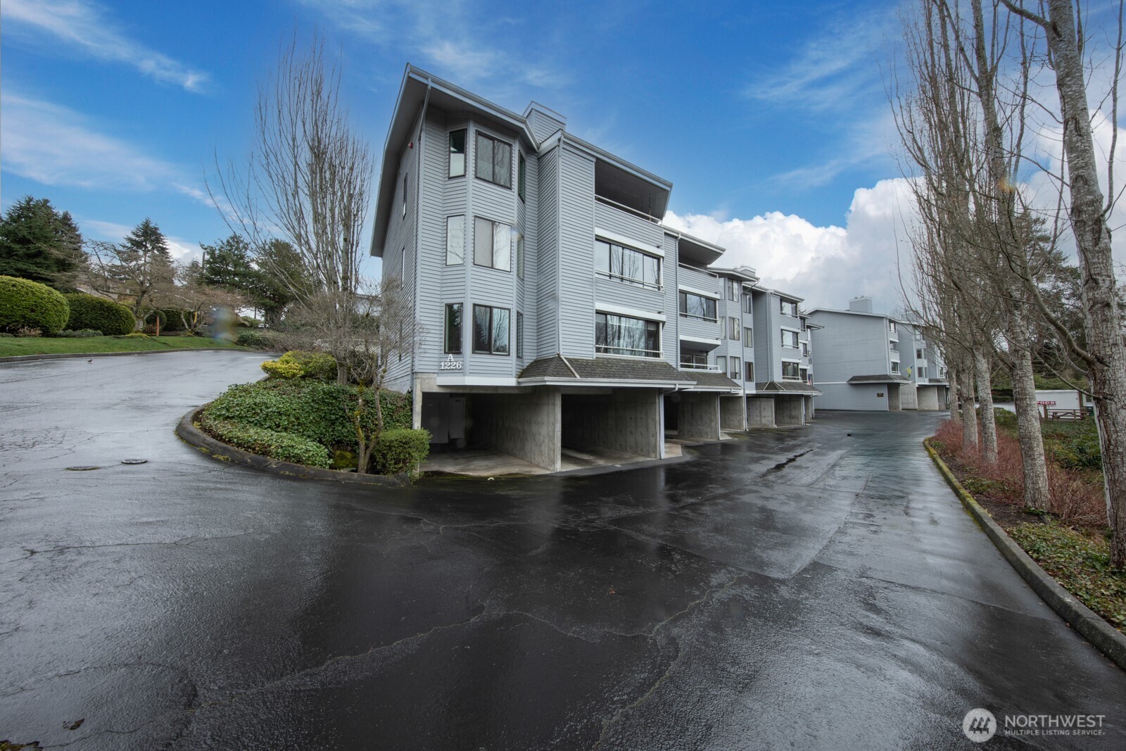 Welcome to Willow Creek in Downtown Edmonds! Nestled in a serene and private setting, this roomy condo features an expansive living room with a cozy wood-burning fireplace. Large picture windows flood the dining area and kitchen with natural light. Down the hall, you’ll find a spacious primary bedroom with a generous walk-in closet. The full bathroom offers plenty of space, including a beautifully renovated shower with new tile. Additional bedroom - perfect for guests/office/hobby room! Enjoy the added convenience of an in-unit laundry room. Don’t miss the covered deck, perfect for year-round relaxation. This unit also comes w/ 2 parking spots and tons storage space! Just steps from fantastic restaurants, shops, beaches, & more in Edmonds!